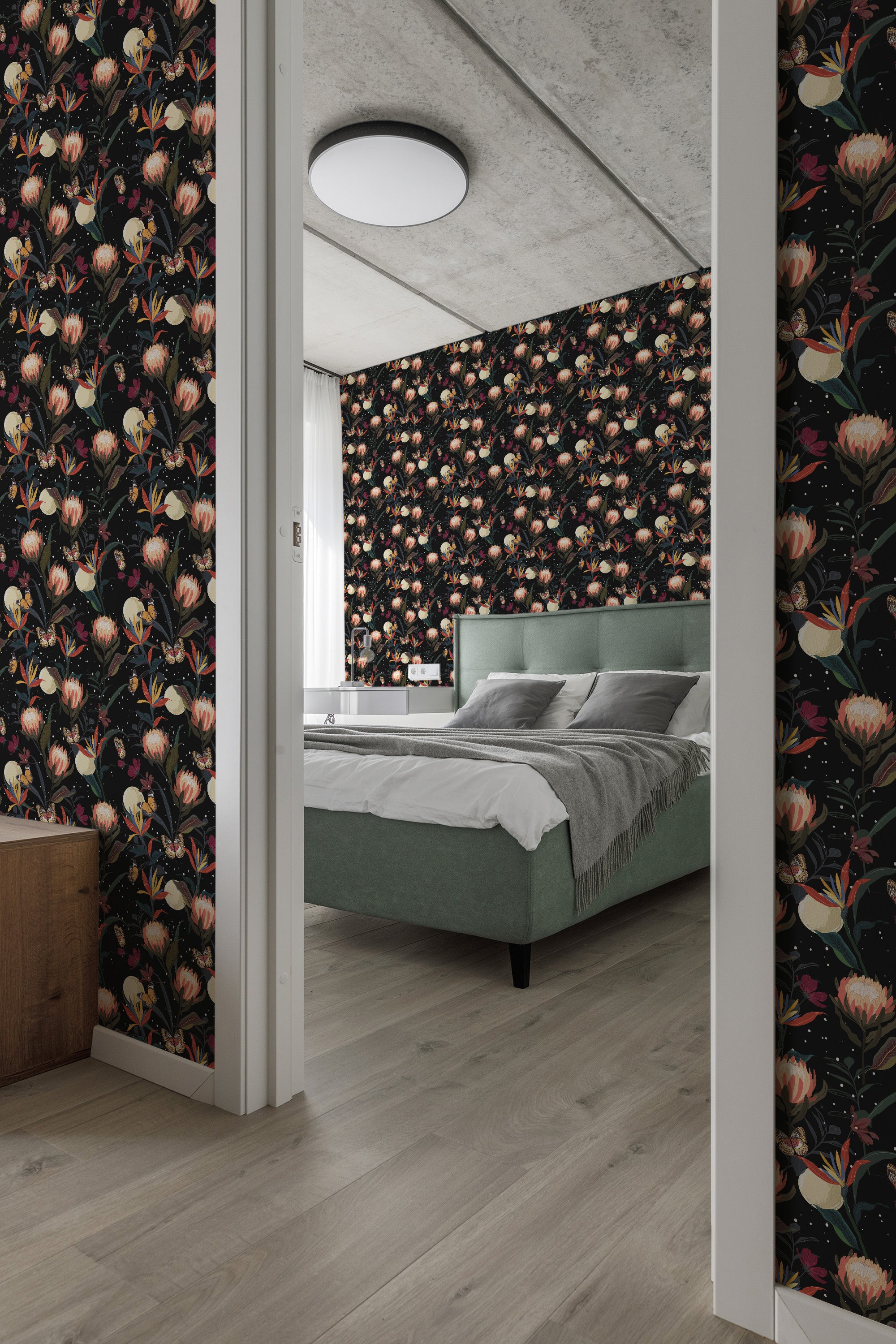 Dark wallpaper with vibrant floral patterns, including pink and orange flowers, placed against a black background in a cozy bedroom. Traditional wallpaper.