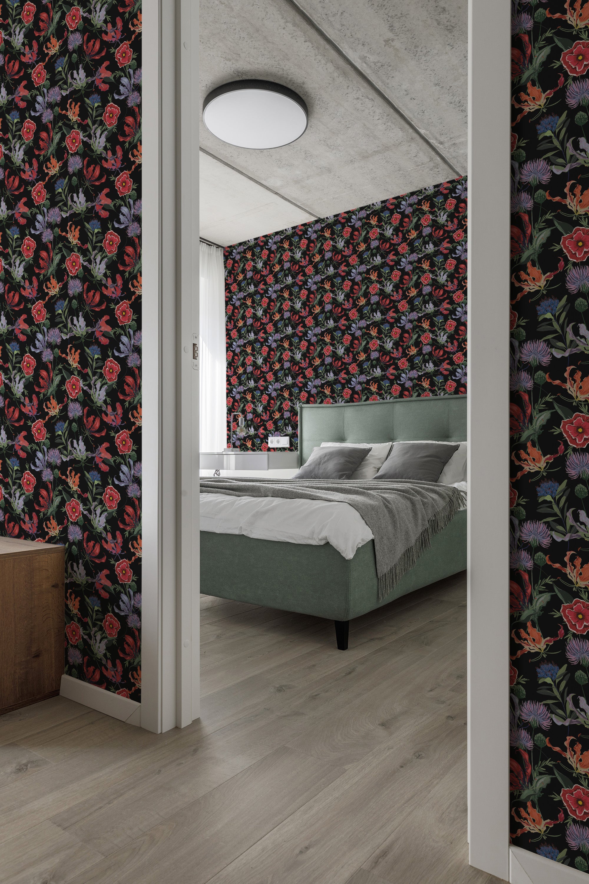 A room with walls covered in Black magic floral wallpaper featuring vibrant red, pink, orange, and purple flowers against a dark background, creating a bold and classic aesthetic. Traditional wallpaper.