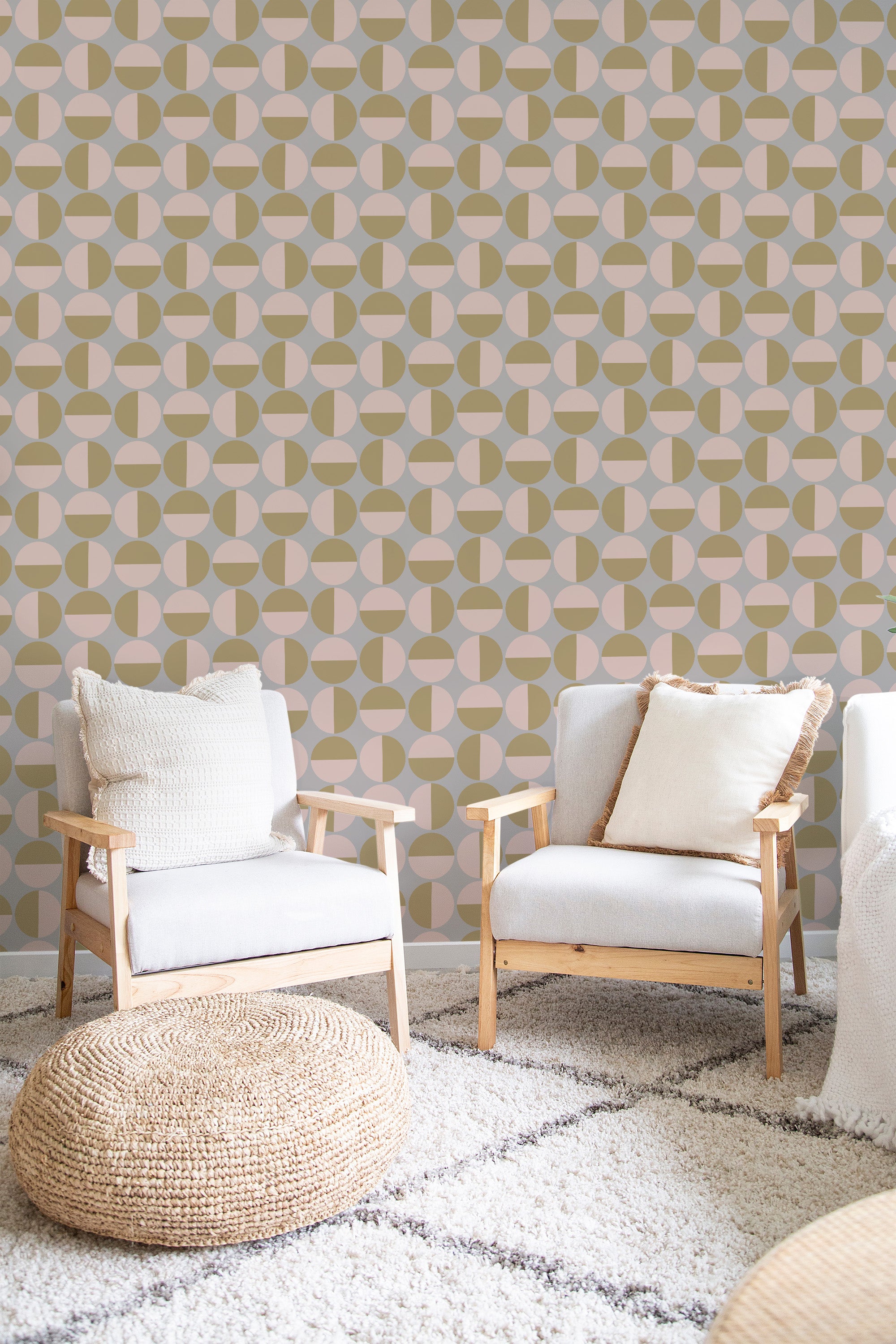 Wallpaper with a mid-century circle design in soft tones of beige, gray, and muted yellow, forming a repeating geometric pattern of interlocking circles and semi-circles. This is traditional wallpaper.