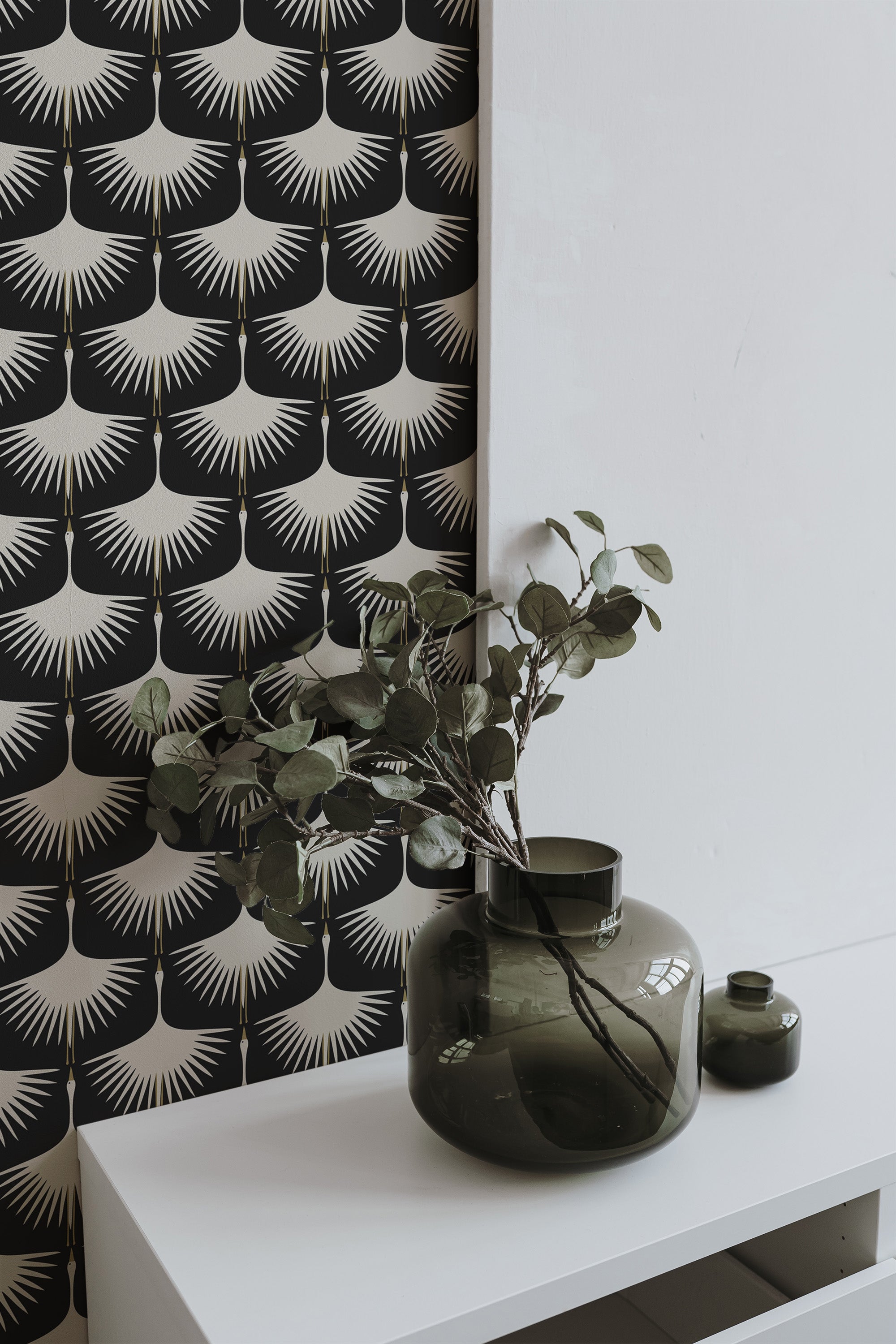 Self-adhesive wallpaper with a small swan design in a minimalist pattern, featuring white silhouettes resembling flying birds against a black background.