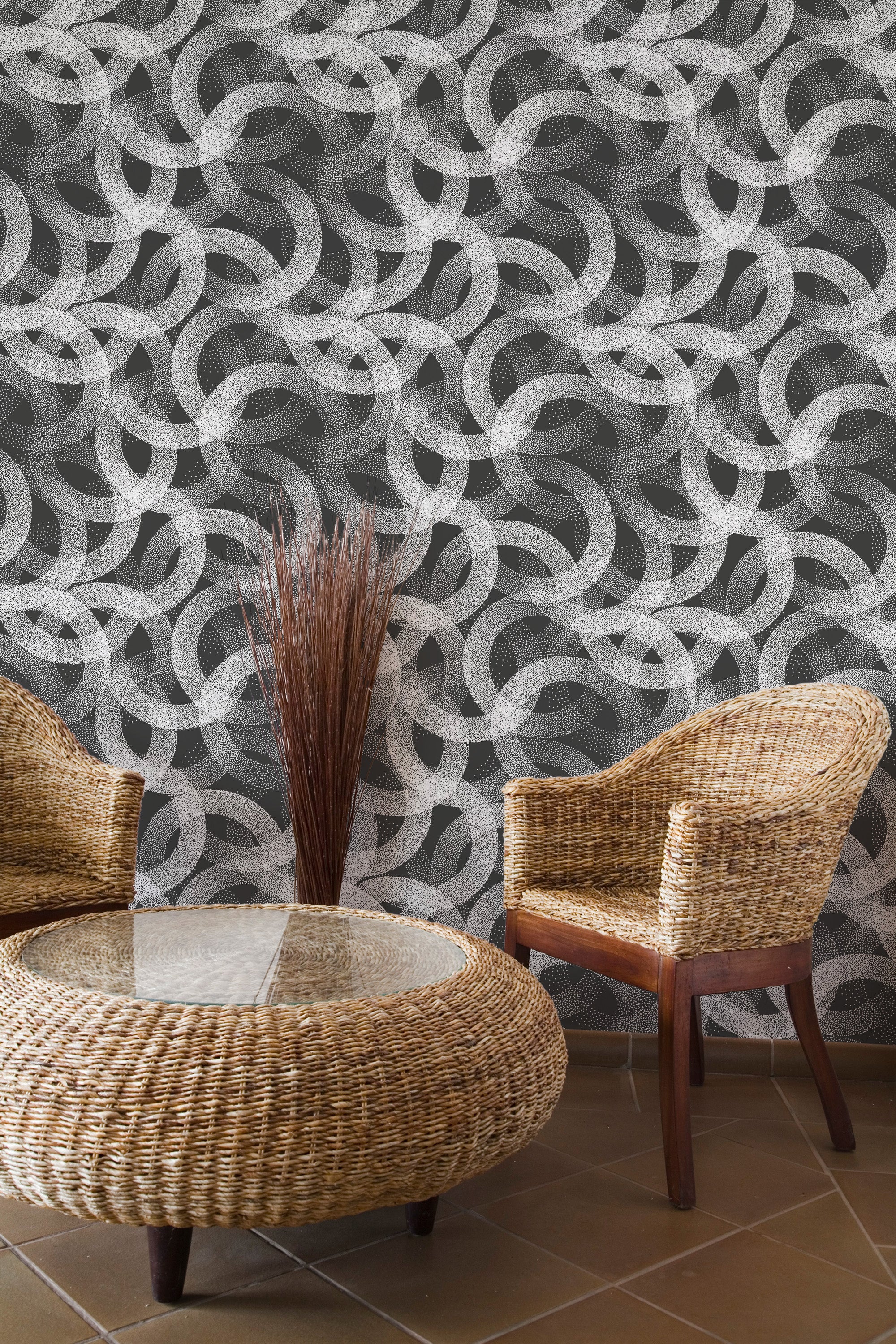 Self-adhesive wallpaper with an abstract dotted lines design, creating interlocking circles in shades of grey and white on a dark background.