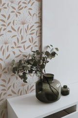 Self-adhesive dandelion wallpaper with a neutral color palette in shades of beige and taupe, featuring delicate floral and leaf patterns that create an elegant, calming atmosphere.