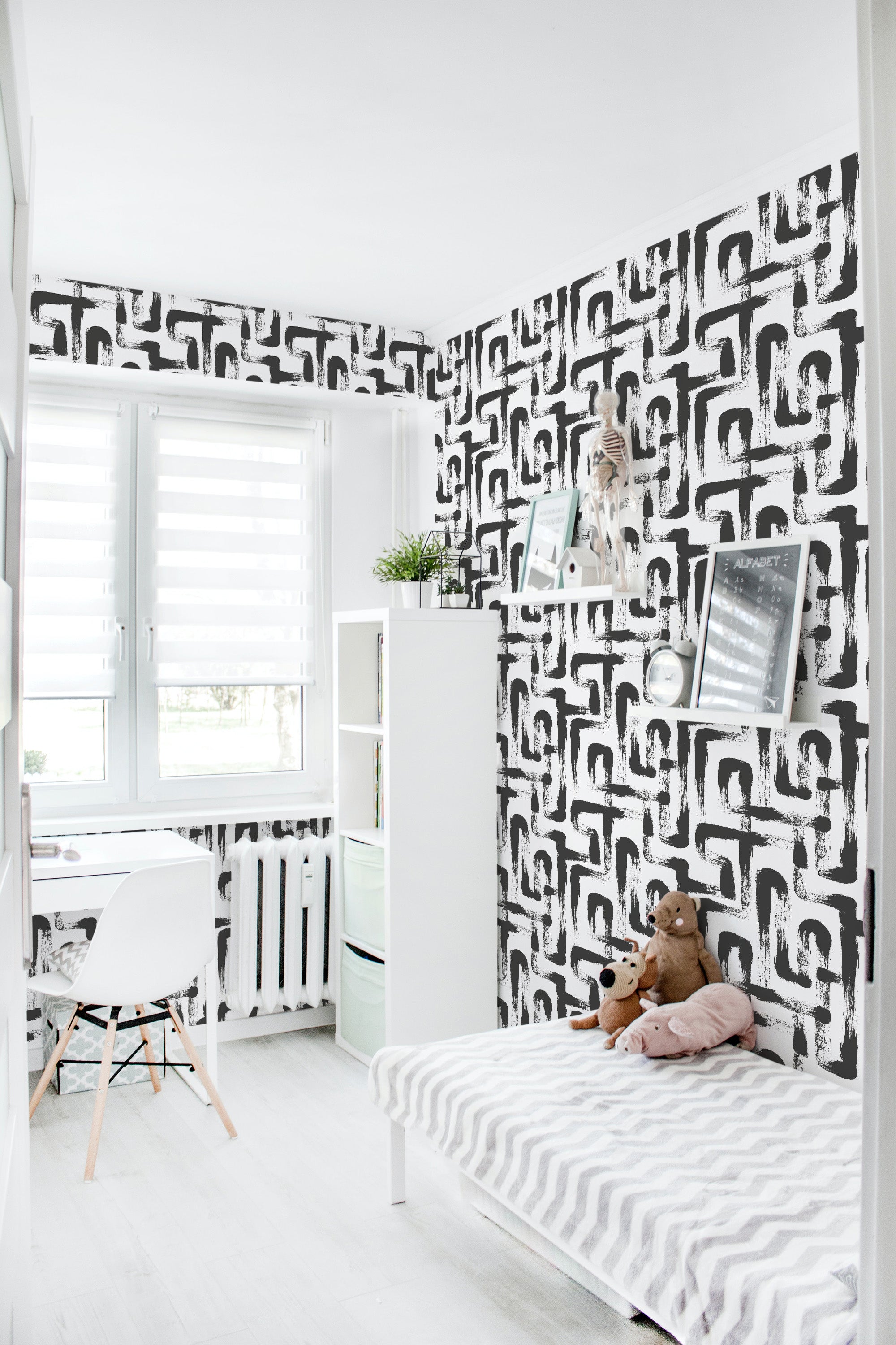 Black and white brushstroke lines cover the walls of a modern room, creating an abstract, artistic pattern on traditional wallpaper.