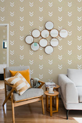 living room cozy sofa armchair pillows decor minimal chevron peel stick wallpaper