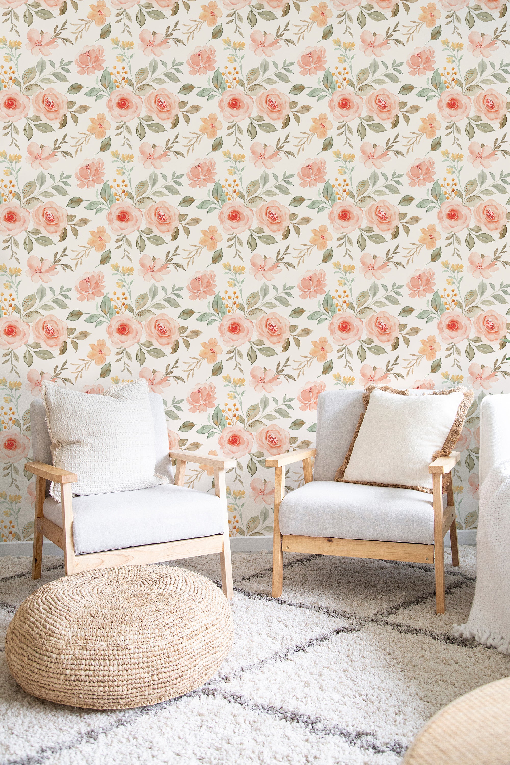 A cozy room with walls adorned in a floral patterned wallpaper with soft pink roses and green foliage, giving a warm and inviting ambiance. Traditional wallpaper.
