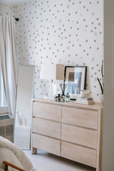         
peel and stick wallpaper stars accent wall bedroom dresser mirror minimalist interior