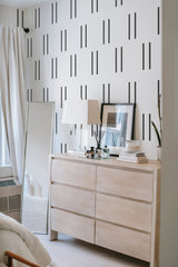         
peel and stick wallpaper simple striped accent wall bedroom dresser mirror minimalist interior