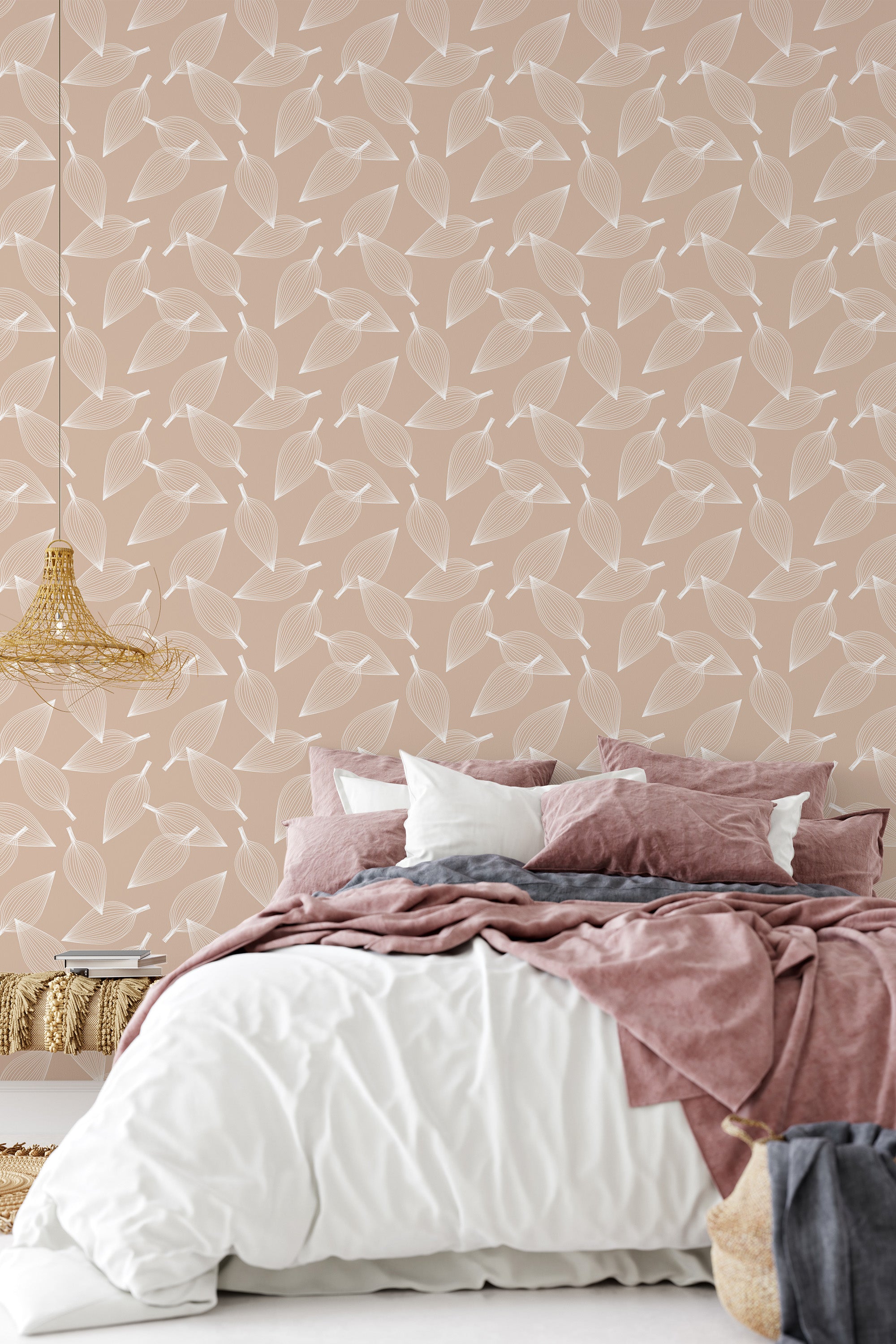 A bedroom with a softly hued wall covered in a repeating leaf pattern, giving a calm, nature-inspired aesthetic to the nursery, traditional wallpaper.