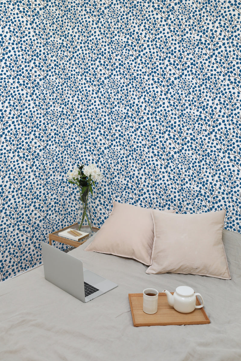 temporary wallpaper tiny blue floral pattern cozy romantic bedroom interior