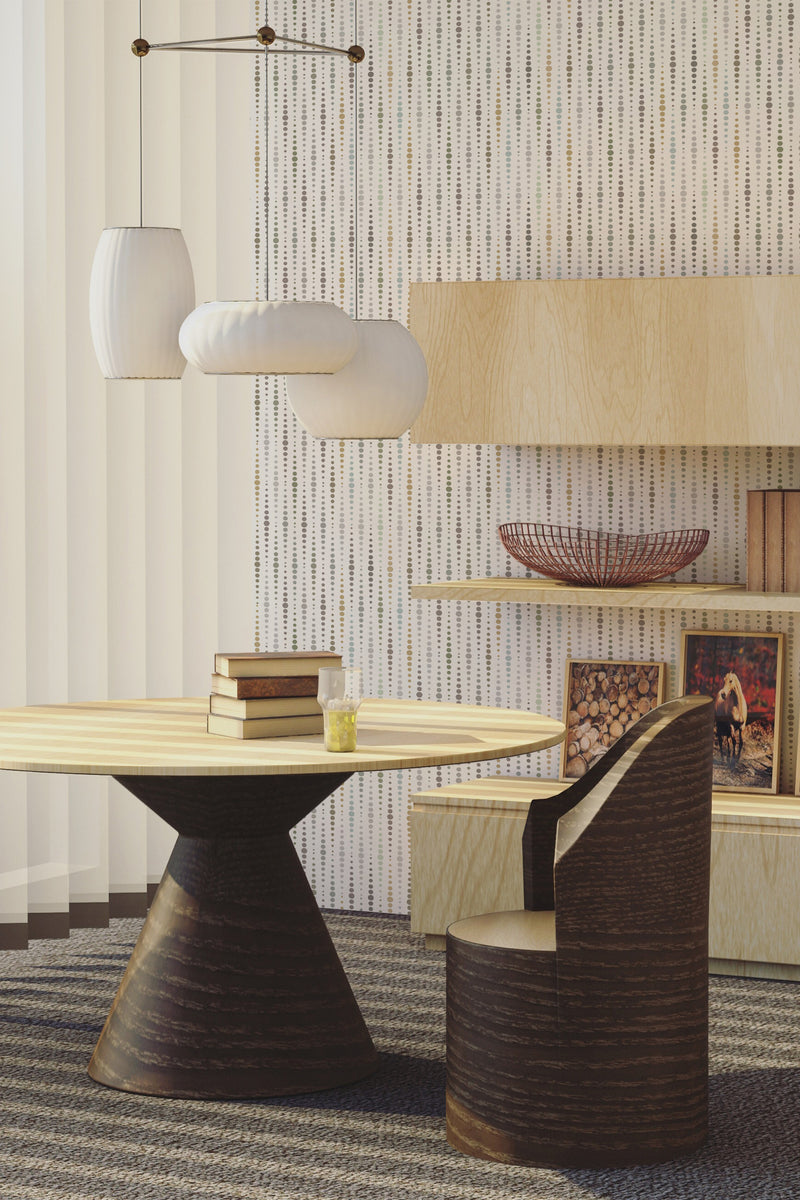 A room with a wall adorned with neutral-colored wallpaper with a pattern of evenly spaced dots, complementing the modern furniture, described as traditional wallpaper.