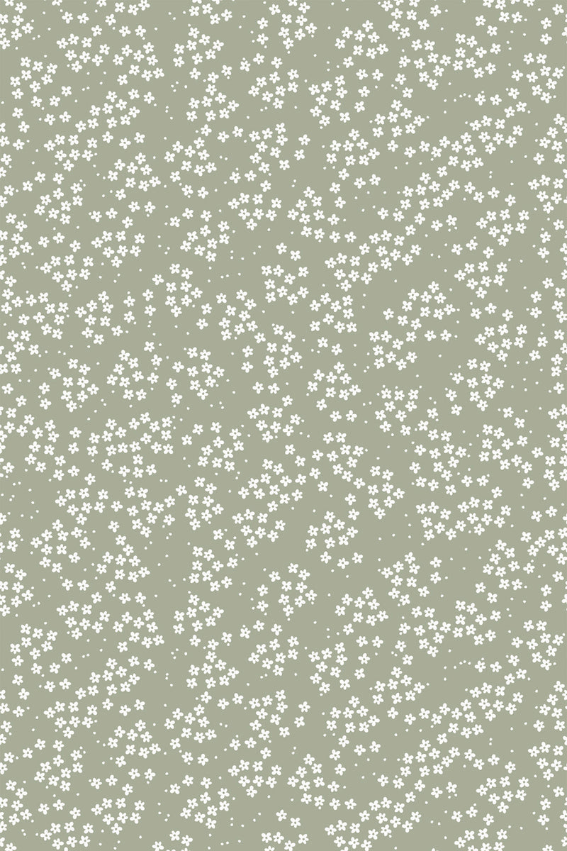 Small white flowers scattered across a muted green background, creating a delicate and subtle pattern for a peel and stick removable wallpaper.