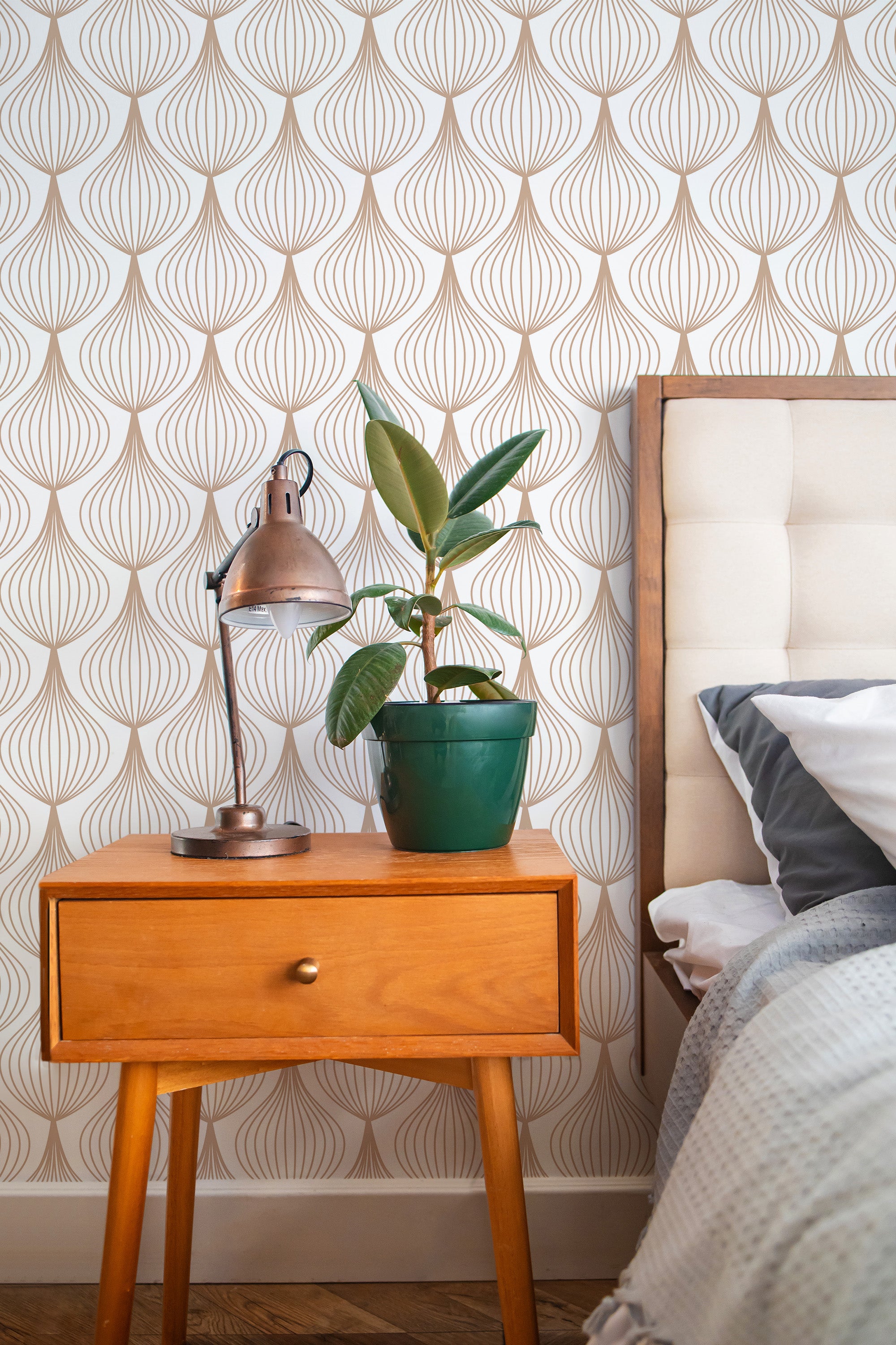 Self-adhesive wallpaper with a brown and white Art Deco line art design, displayed in a pattern of stylized leaf-like shapes.