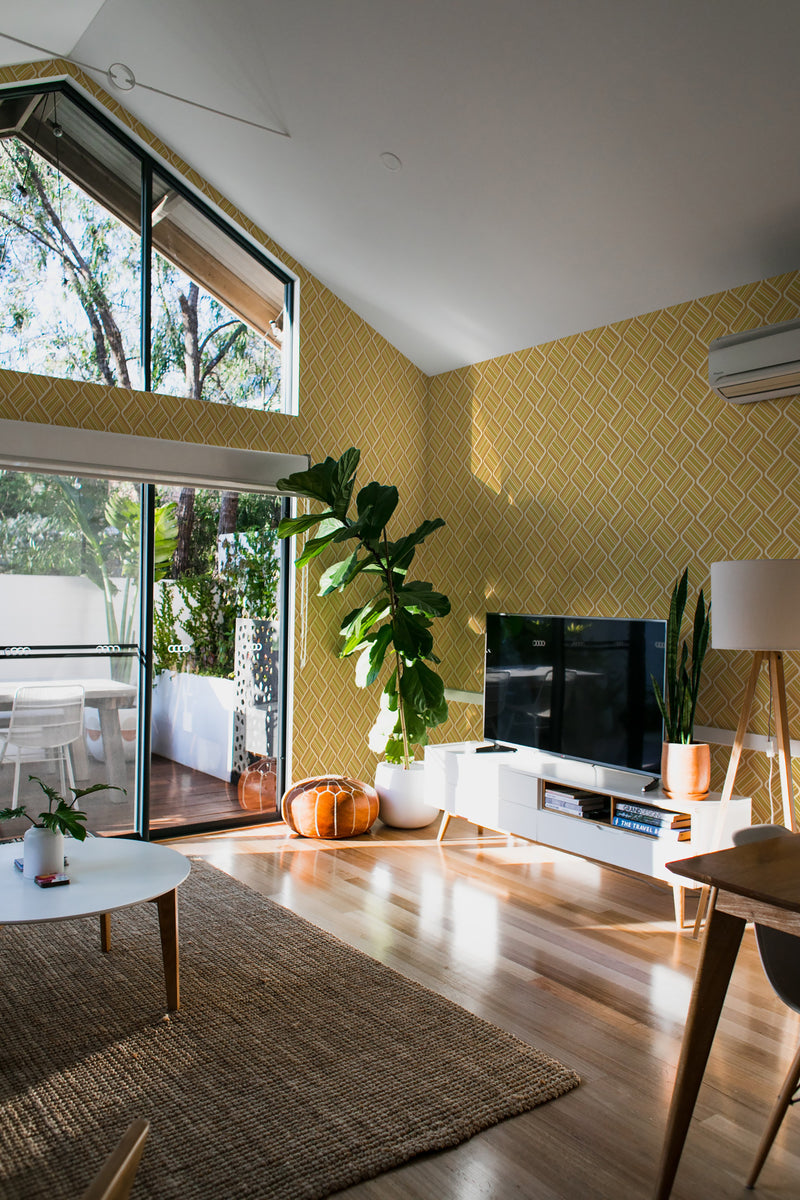 minimalist house terrace green plants living room yellow retro squares stick and peel wallpaper
