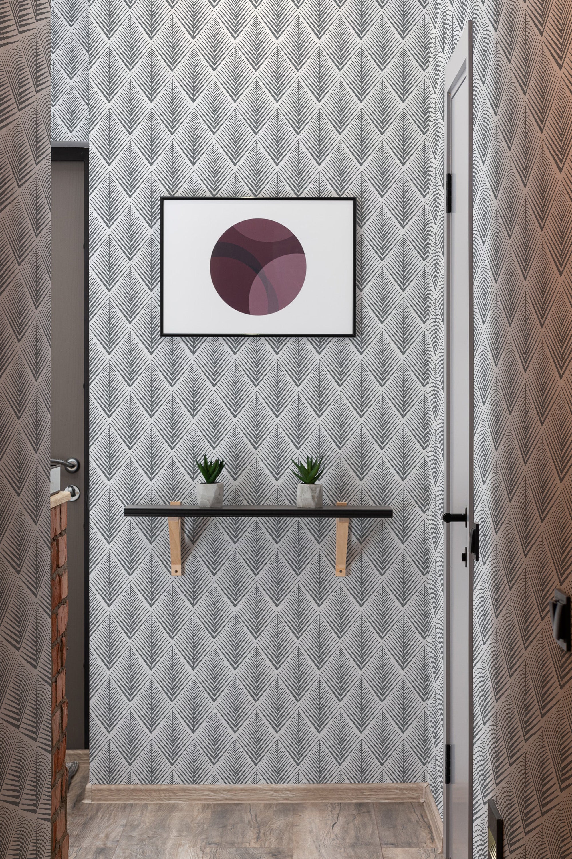 Wallpaper with a repeating geometric arch pattern in shades of gray, creating a textured and layered appearance. The subtle and symmetrical design adds depth and dimension to the room, giving it a classic and elegant feel. Traditional wallpaper.