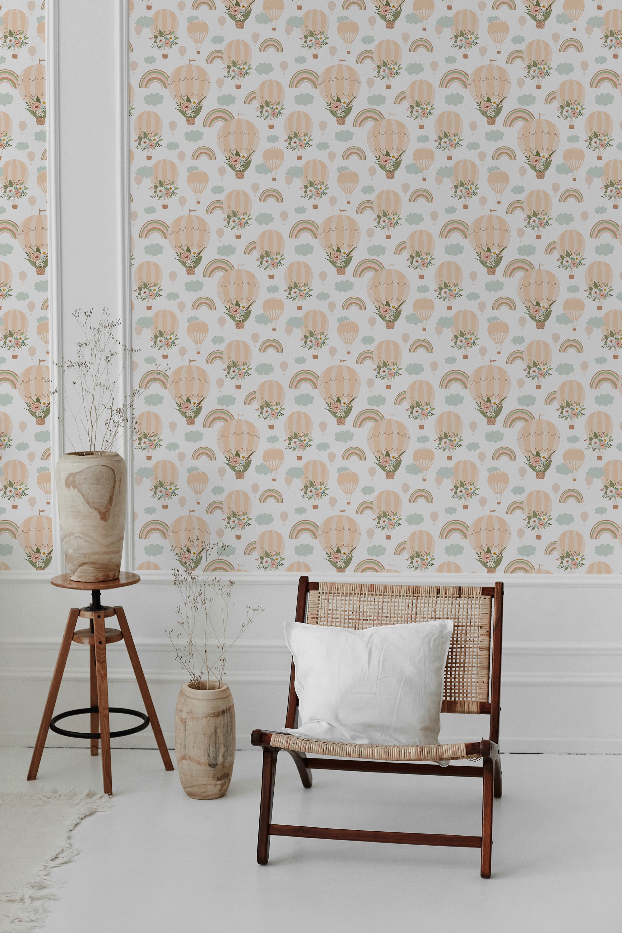 Whimsical wallpaper with a repeating pattern of vintage hot air balloons, soft pastel-colored clouds, and muted rainbows in nature-inspired hues, covering the wall of a room with a cozy chair and minimalistic d��cor. Traditional wallpaper.