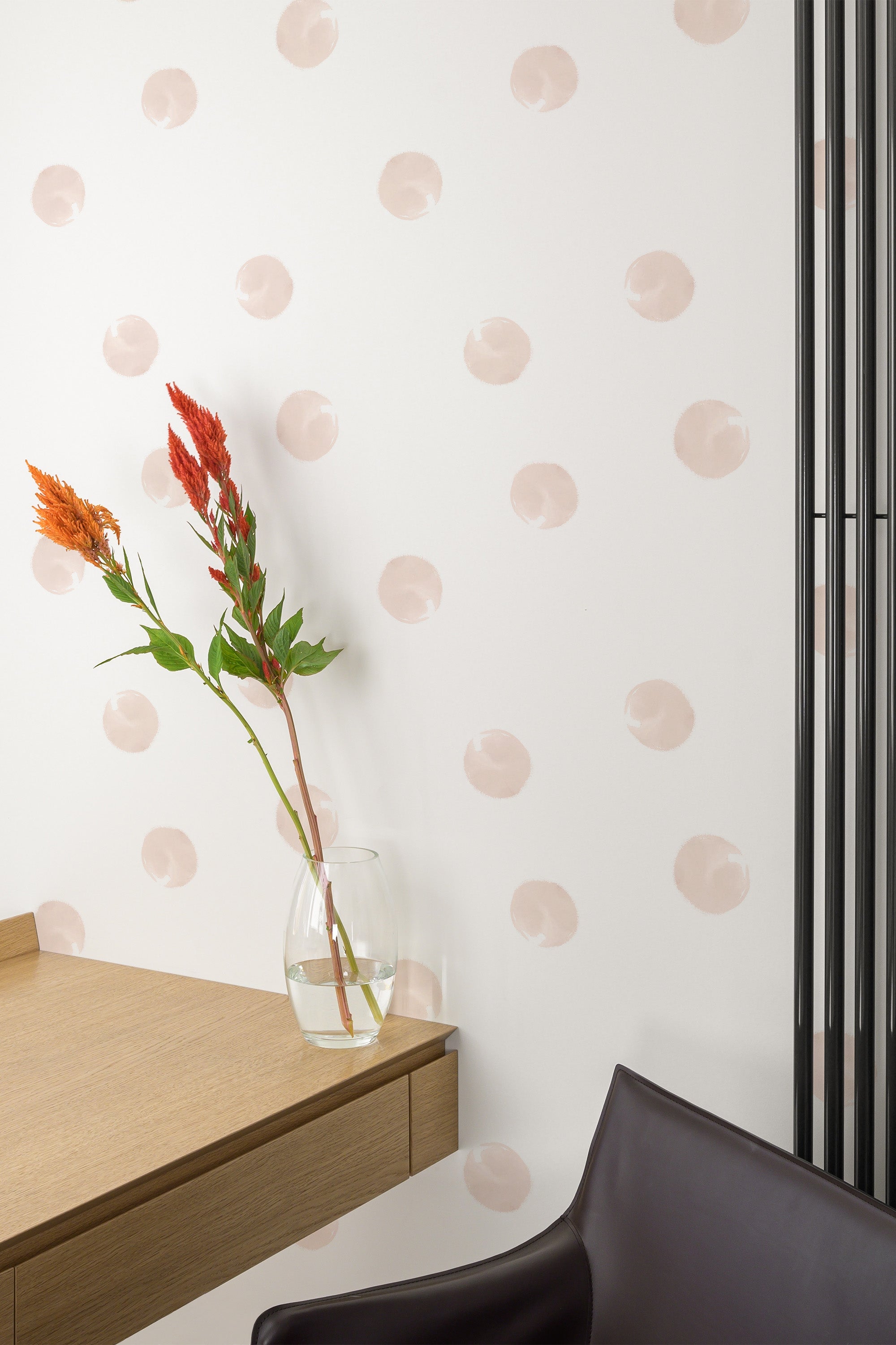 Self-adhesive wallpaper with a minimalistic design of evenly spaced, soft blush pink dots on a white background. The dots resemble gentle brush strokes, creating a subtle modern and playful aesthetic.