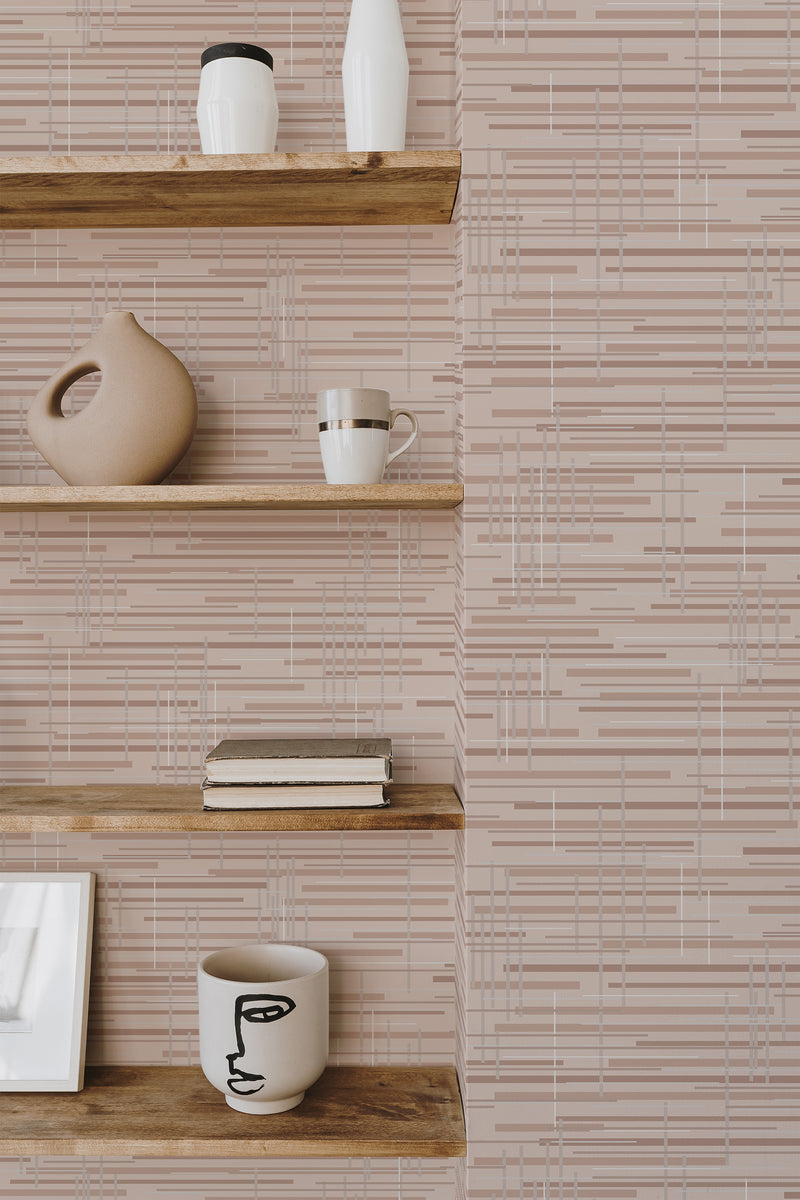 Self-adhesive pink texture wallpaper with a modern geometric pattern of horizontal and vertical lines in varying shades of pink and beige, creating a subtle yet stylish effect on the wall.