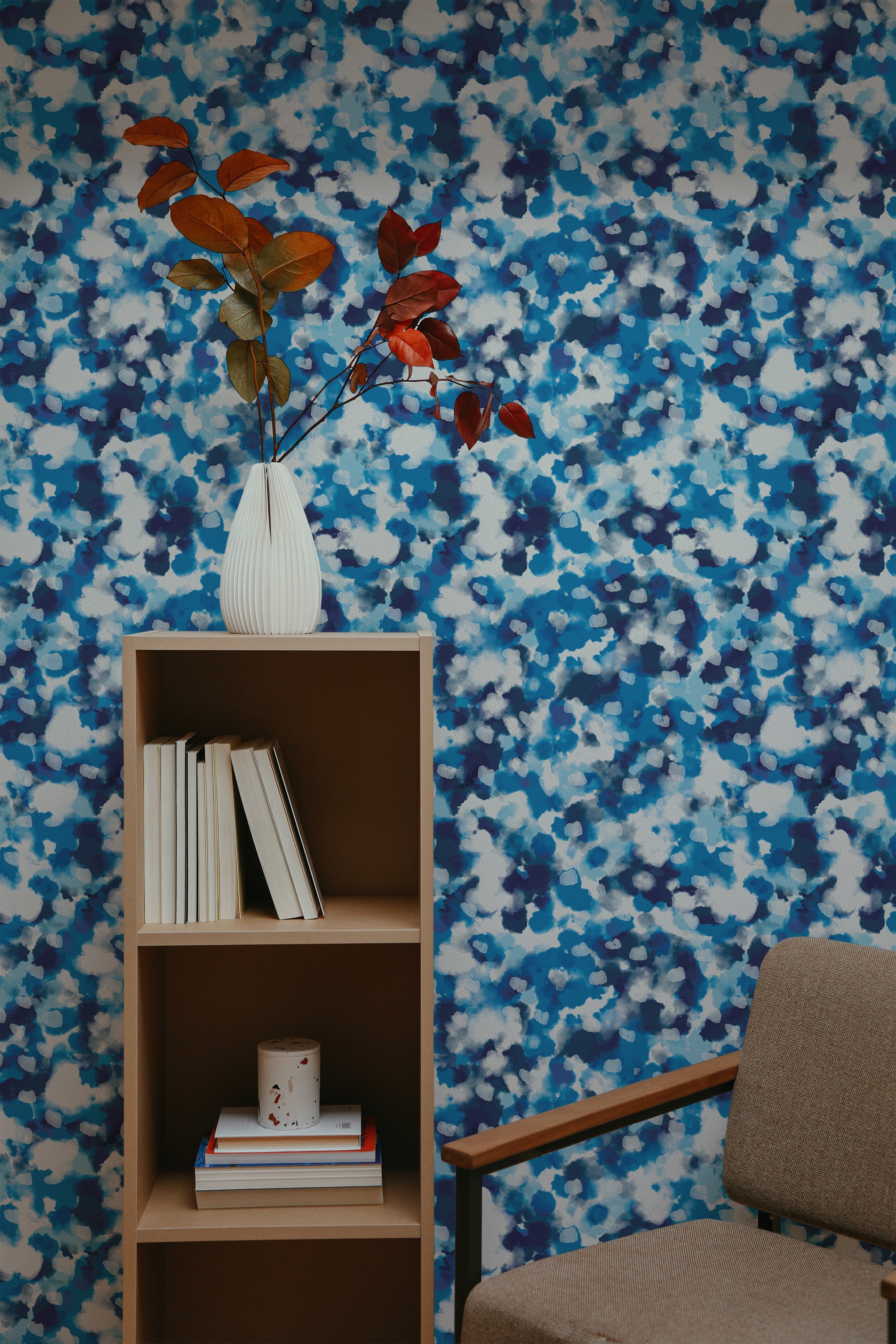 Self-adhesive wallpaper with a vibrant, abstract pattern in shades of blue, white, and hints of black, creating a dynamic, cloud-like effect.