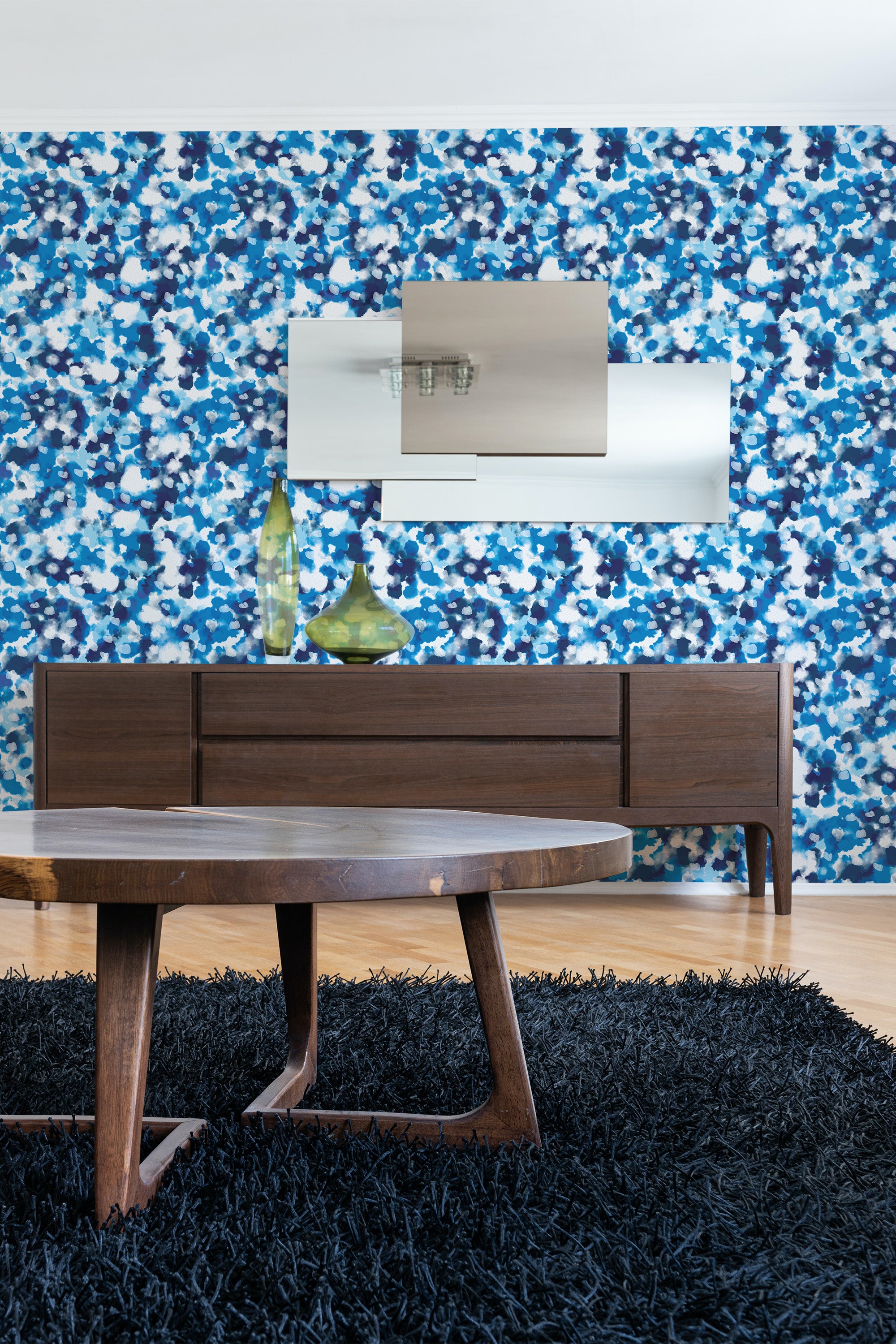 Colorful wallpaper with an abstract pattern in shades of blue, white, and black, creating a visually dynamic effect. This is an example of traditional wallpaper.