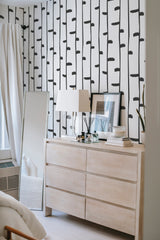         
peel and stick wallpaper minimal birch accent wall bedroom dresser mirror minimalist interior