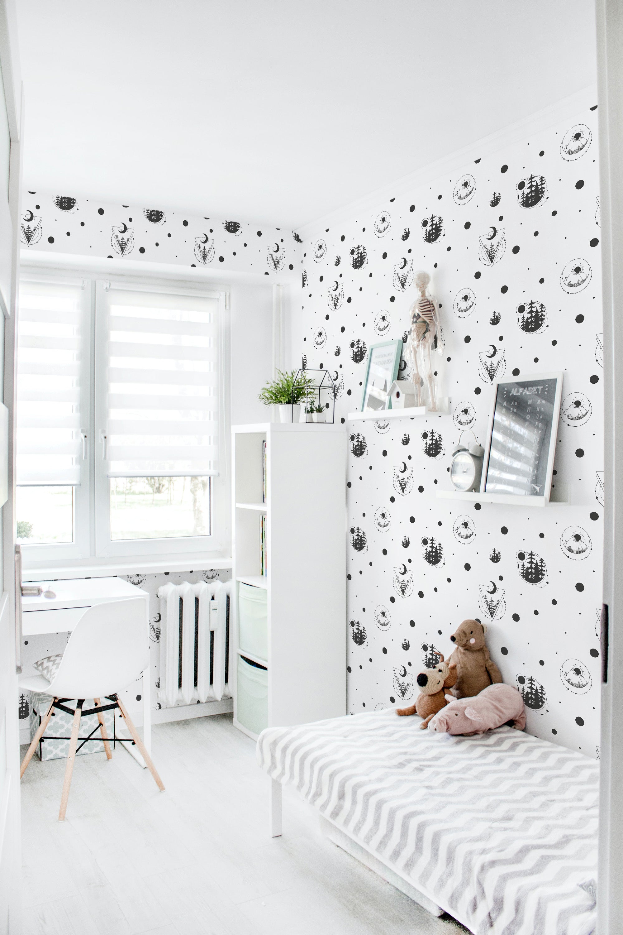 Room with Celestial wallpaper design, displaying black and white moons, stars, and constellations, creating a calm and serene ambiance. Traditional wallpaper.