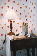 peel and stick wallpaper cupcake pattern accent wall bedroom nightstand interior