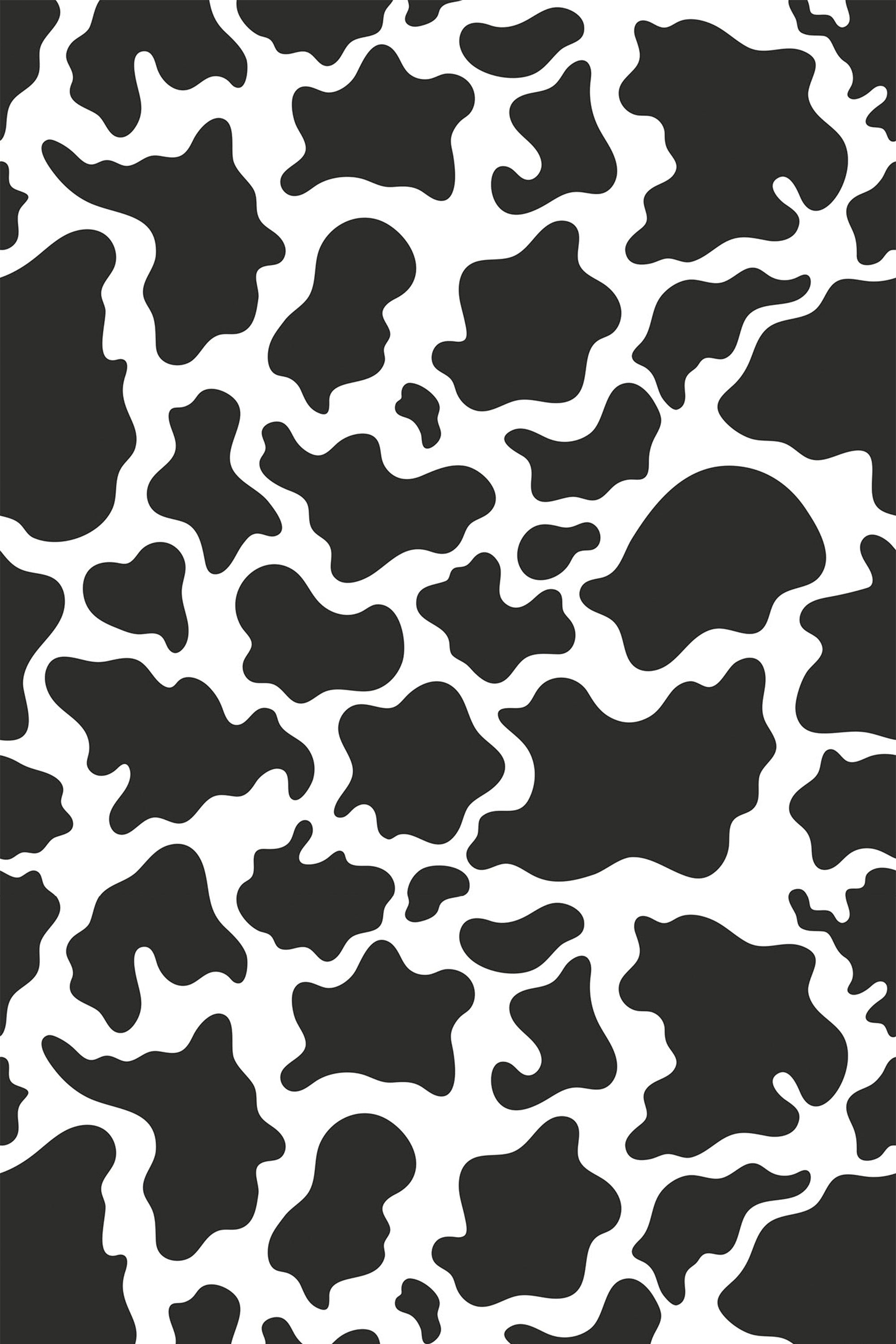 Black and white abstract cow print pattern with irregular, organic shapes resembling cow hide. Peel and stick removable wallpaper.