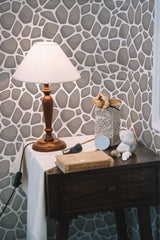 peel and stick wallpaper stone pattern accent wall bedroom nightstand interior