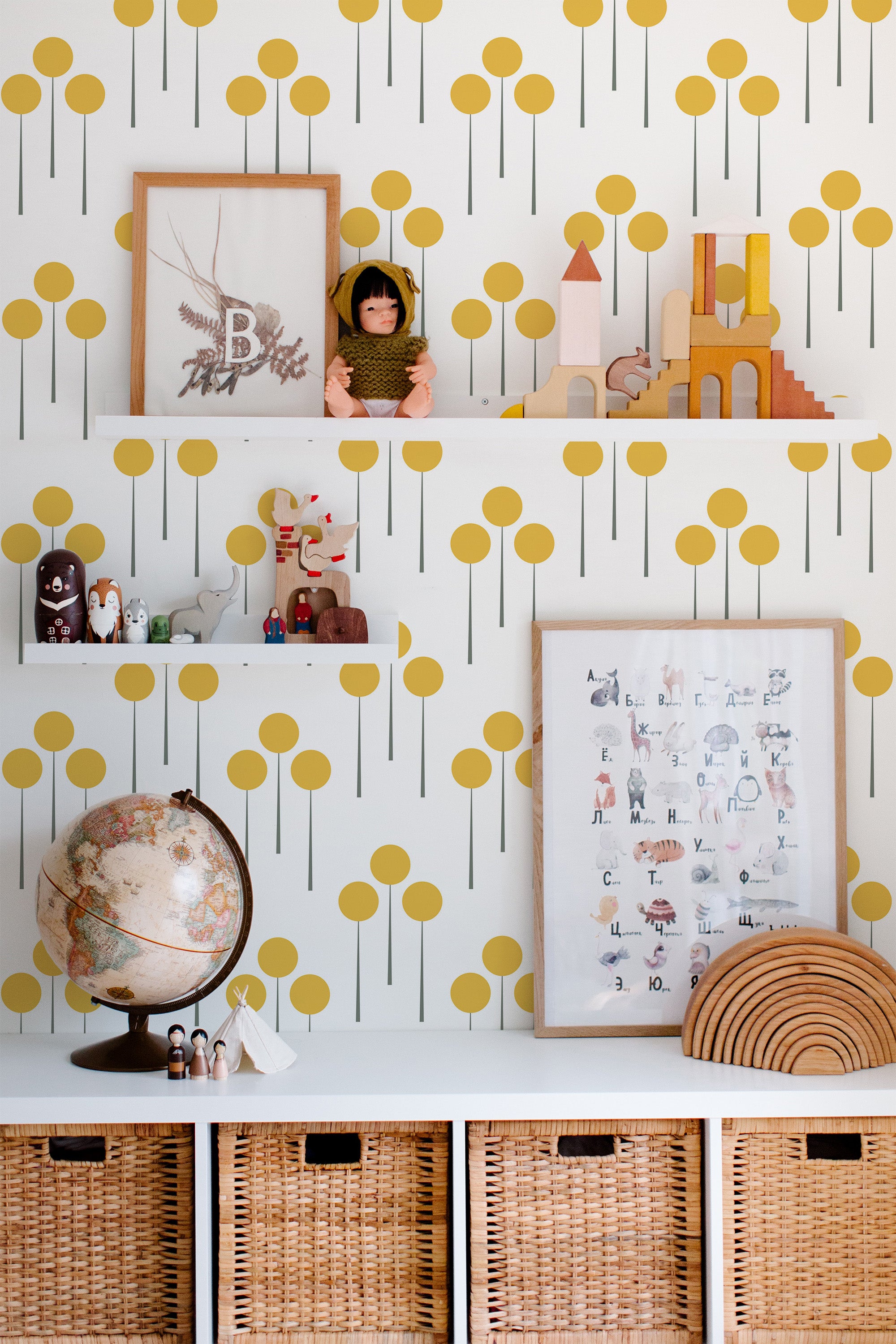 Self-adhesive wallpaper with a Retro dots design, featuring large mustard yellow circles evenly spaced on a white background with thin vertical black lines. The playful, vintage pattern adds a pop of color and whimsy to the room.
