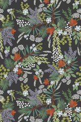 Floral wallpaper with a dark background adorned with vibrant, lush botanical patterns including white, lavender, and red flowers, green leaves, and sprigs accented with berries, creating a rich and lively garden-inspired effect. Peel and stick removable wallpaper.