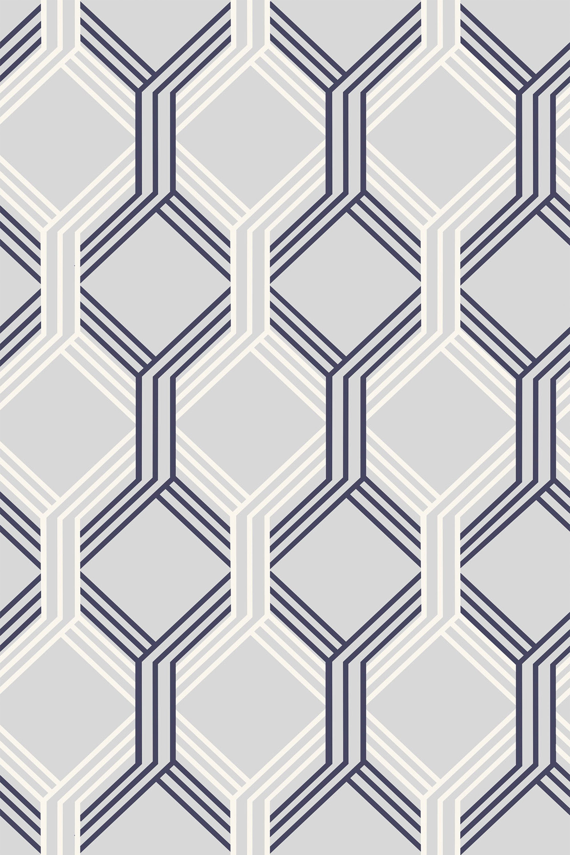 A repeating pattern of interlocking hexagons in navy blue and white, with geometric lines and shapes creating a three-dimensional effect on a light gray background. Peel and stick removable wallpaper.