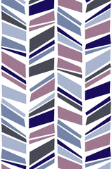 Herringbone design with angular, irregular stripes in varying shades of purple, blue, black, and white, arranged in a repeating pattern. Peel and stick removable wallpaper.