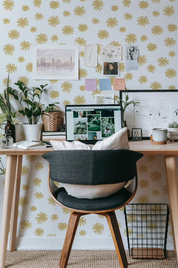 Self-adhesive wallpaper with a floral dots design in a repeating pattern of soft yellow flower-like shapes on a white background, adding a bright and playful touch to the room.