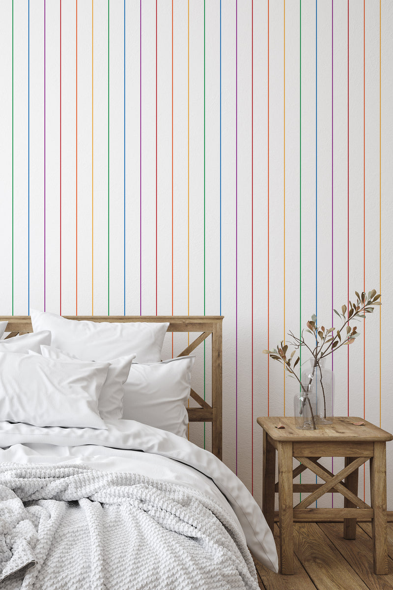 simple bedroom bed nightstand decorative vase rainbow stripe wall decor