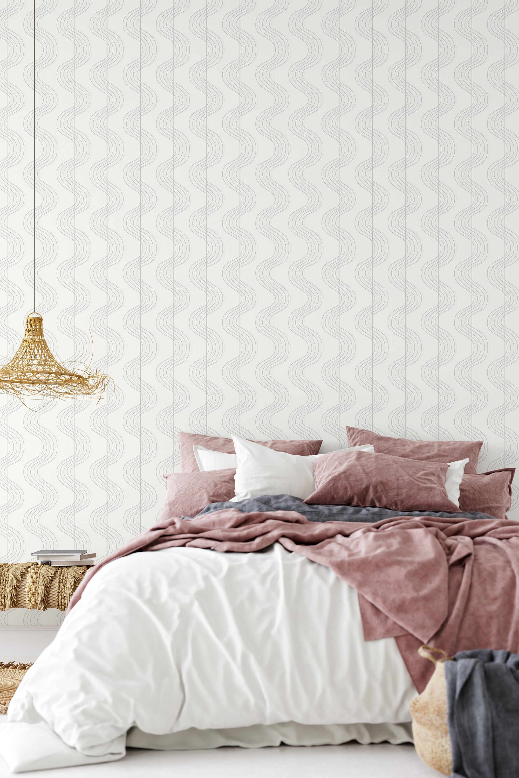 The wallpaper has a subtle, wavy line pattern in neutral tones, creating a soft, serene ambiance that complements the cozy room d��cor. Traditional wallpaper.