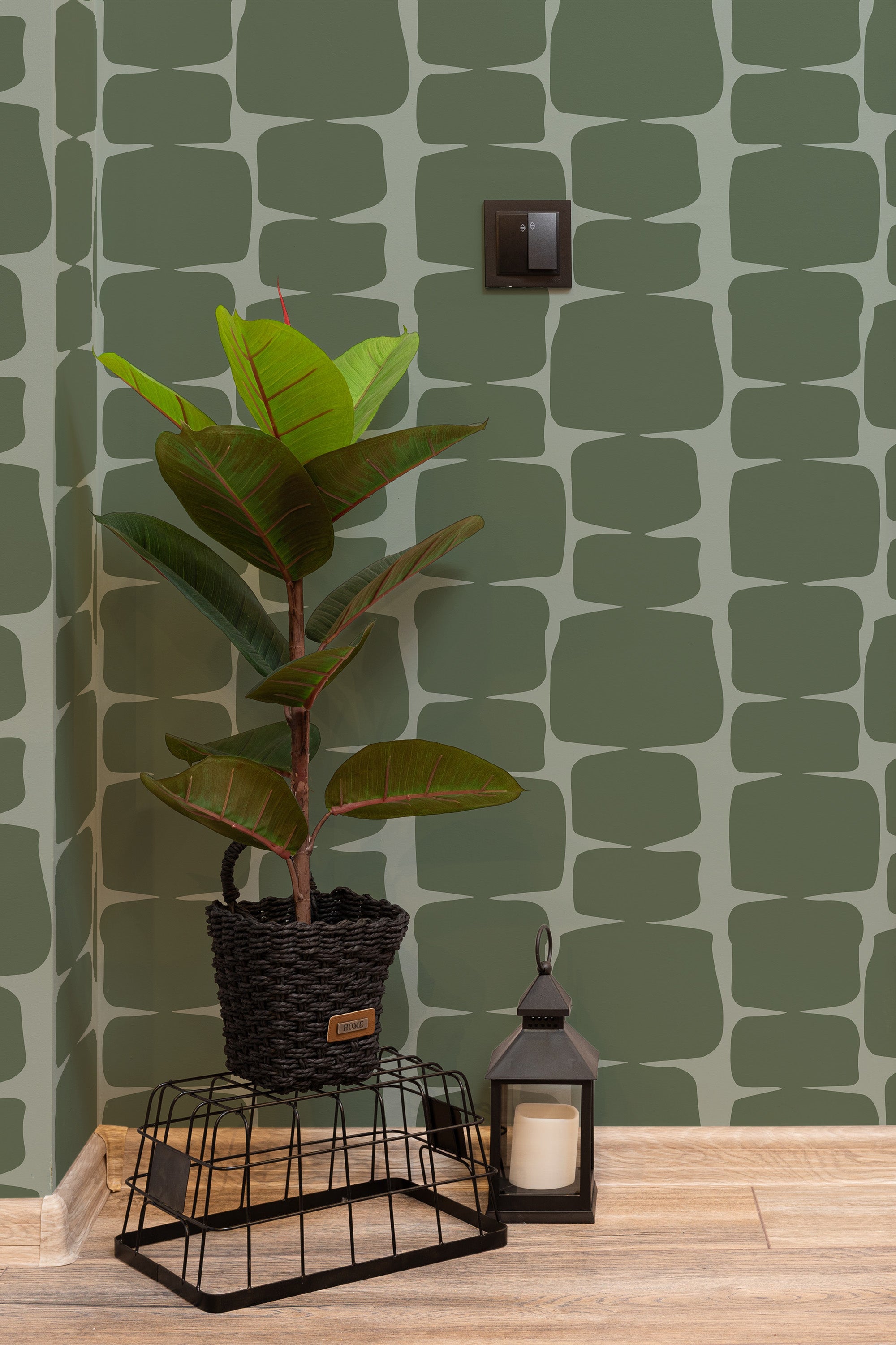 Self-adhesive wallpaper with a green retro shape design, consisting of abstract, rounded rectangles in varying shades of green, creating a vintage and geometric aesthetic.