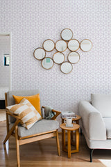 living room cozy sofa armchair pillows decor hexagonal peel stick wallpaper