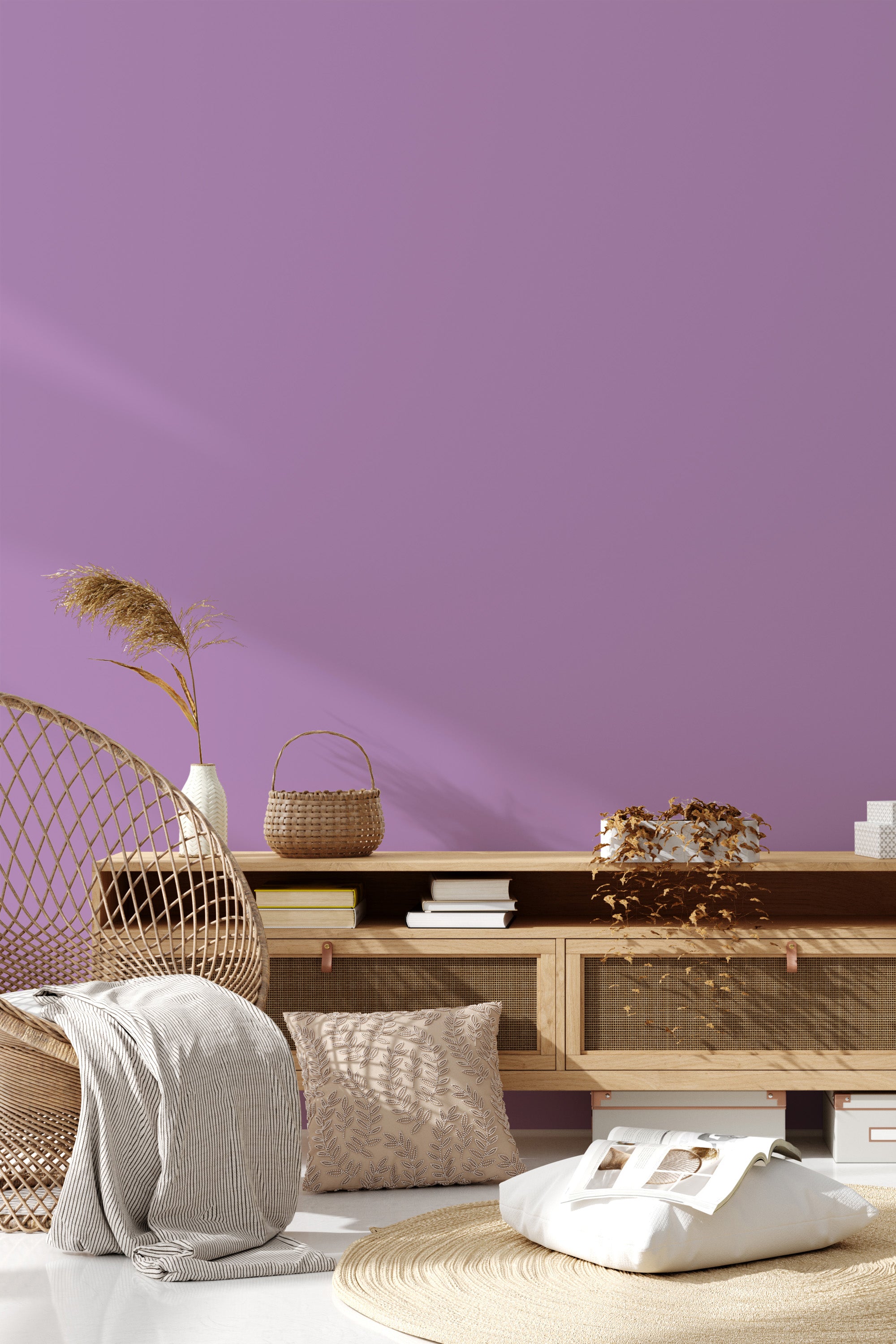 A room with a soft, solid lavender wallpaper covering the walls, creating a smooth and serene atmosphere. Traditional wallpaper.
