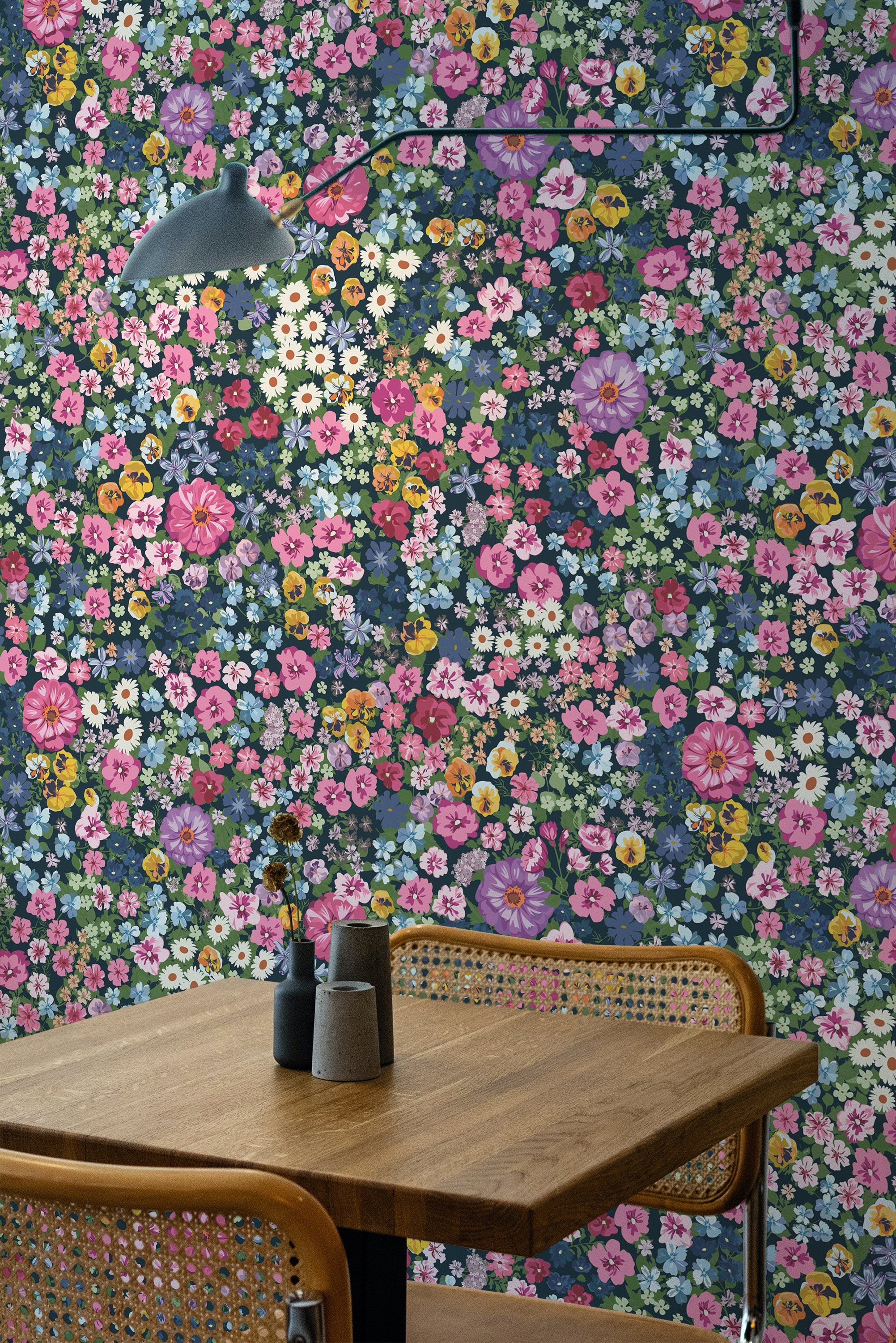 Self-adhesive wallpaper with a vibrant floral pattern featuring a variety of colorful flowers in shades of pink, purple, yellow, and white, set against a dark background.