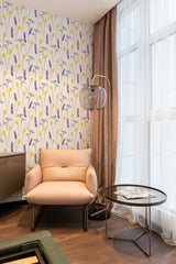 Wallpaper with a pattern of delicate lavender sprigs interspersed with small yellow flowers on a white background in a cozy room. Traditional wallpaper.