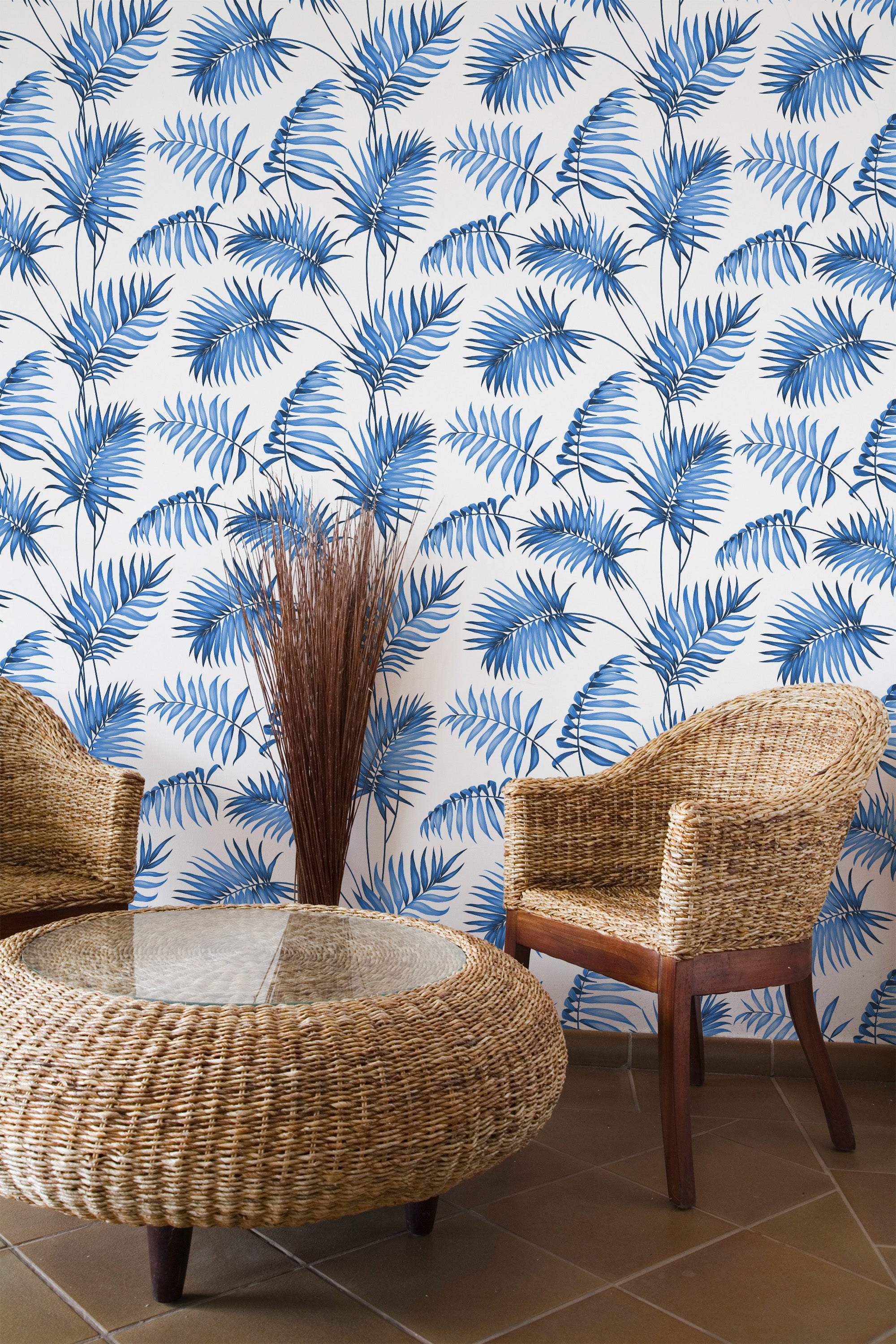 Self-adhesive wallpaper with a French palm leaf design in blue, set against a white background. The leaves are arranged in a vertical pattern, creating a tropical and elegant atmosphere.