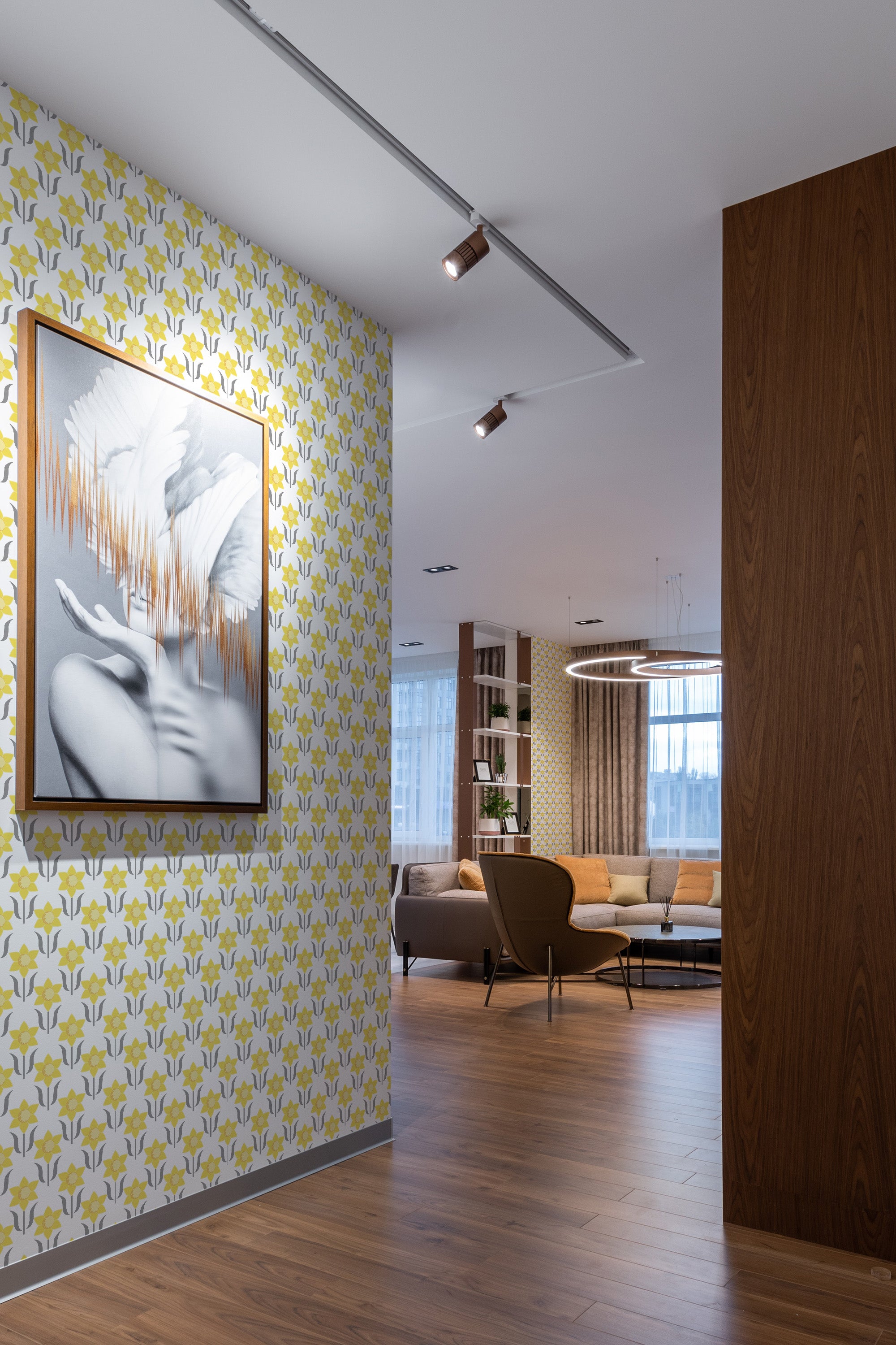 Yellow art nouveau wallpaper with repeating stylized floral patterns in soft yellow and white tones, creating a vintage and elegant atmosphere in the room, traditional wallpaper.