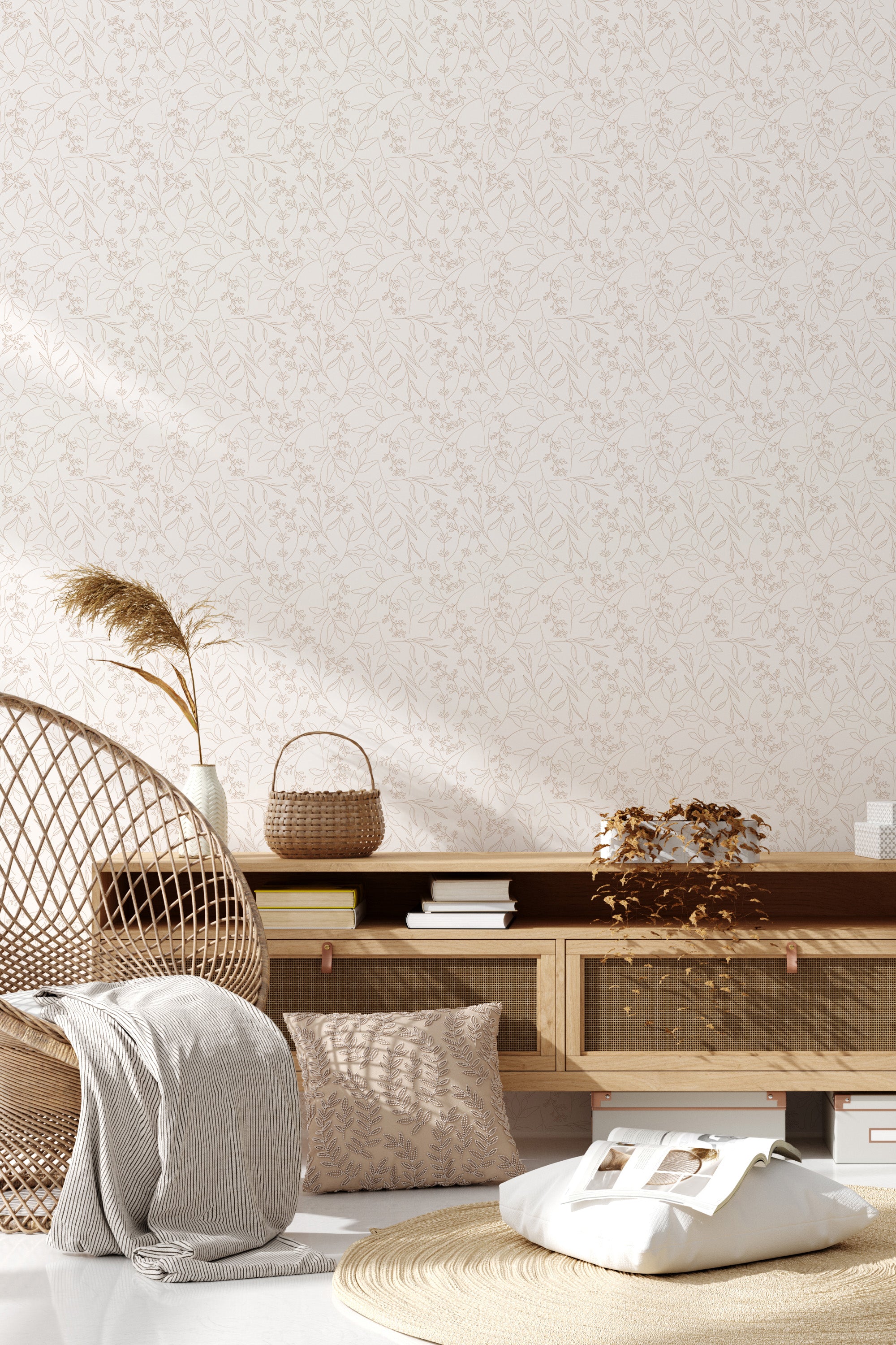 A wall adorned with a subtle, intricate floral pattern in soft, neutral tones, creating a serene and elegant atmosphere in the room. The design incorporates delicate leaves and flowers, adding a classic and timeless touch to the living space. Traditional wallpaper.