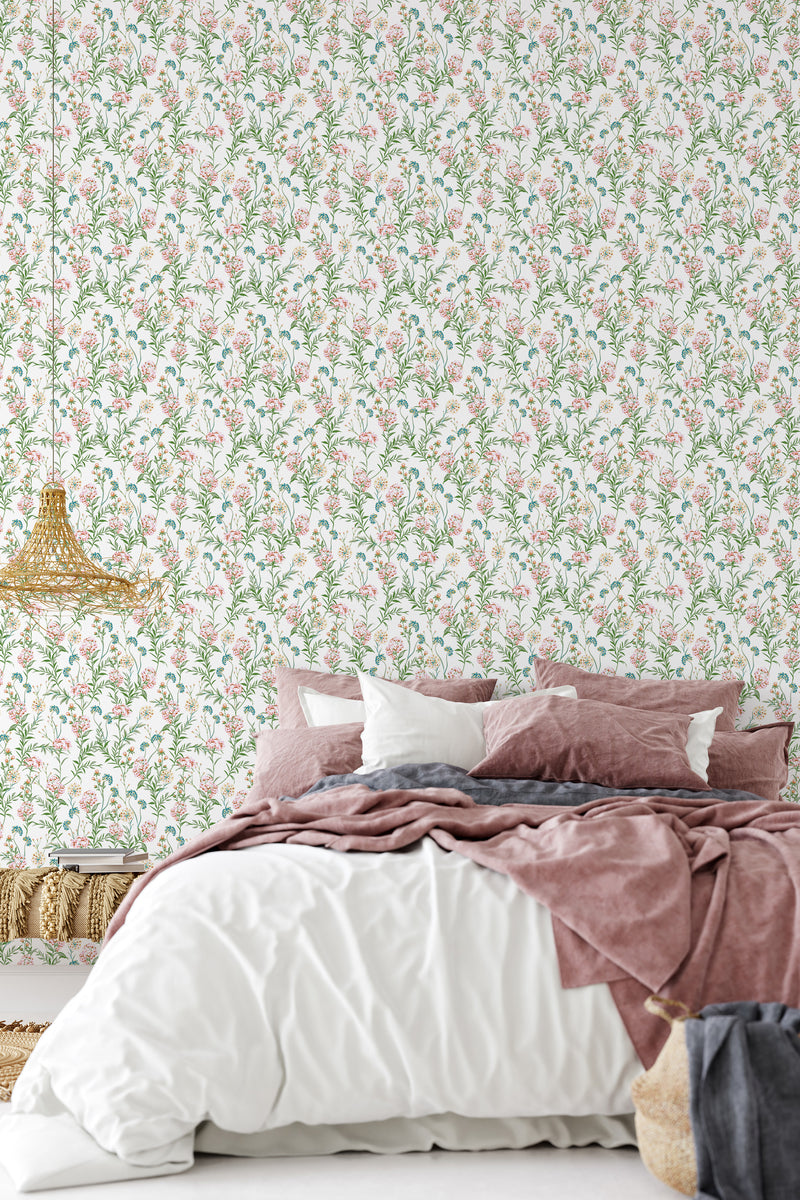 A room with a wall covered in wallpaper with a delicate pattern of pastel-colored flowers and green leaves intertwined on a soft white background. Traditional wallpaper.