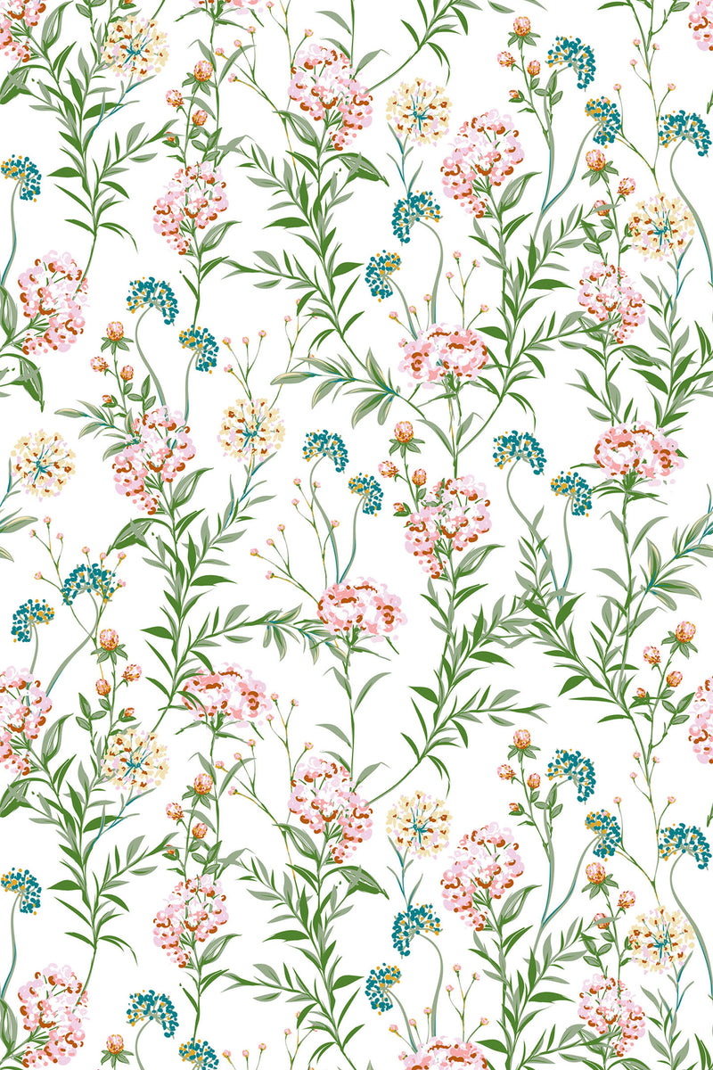 Pastel meadow wallpaper with delicate wildflowers in soft pink, blue, and yellow hues, surrounded by vibrant green foliage on a white background, creating a fresh and serene natural feel. Peel and stick removable wallpaper.