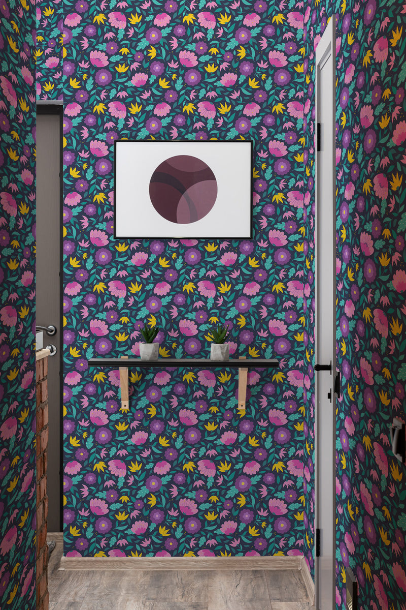 Dark floral wallpaper with vibrant, bold colors including purple, pink, and yellow flowers with green leaves on a dark background, creating a striking and rich visual contrast. Traditional wallpaper.
