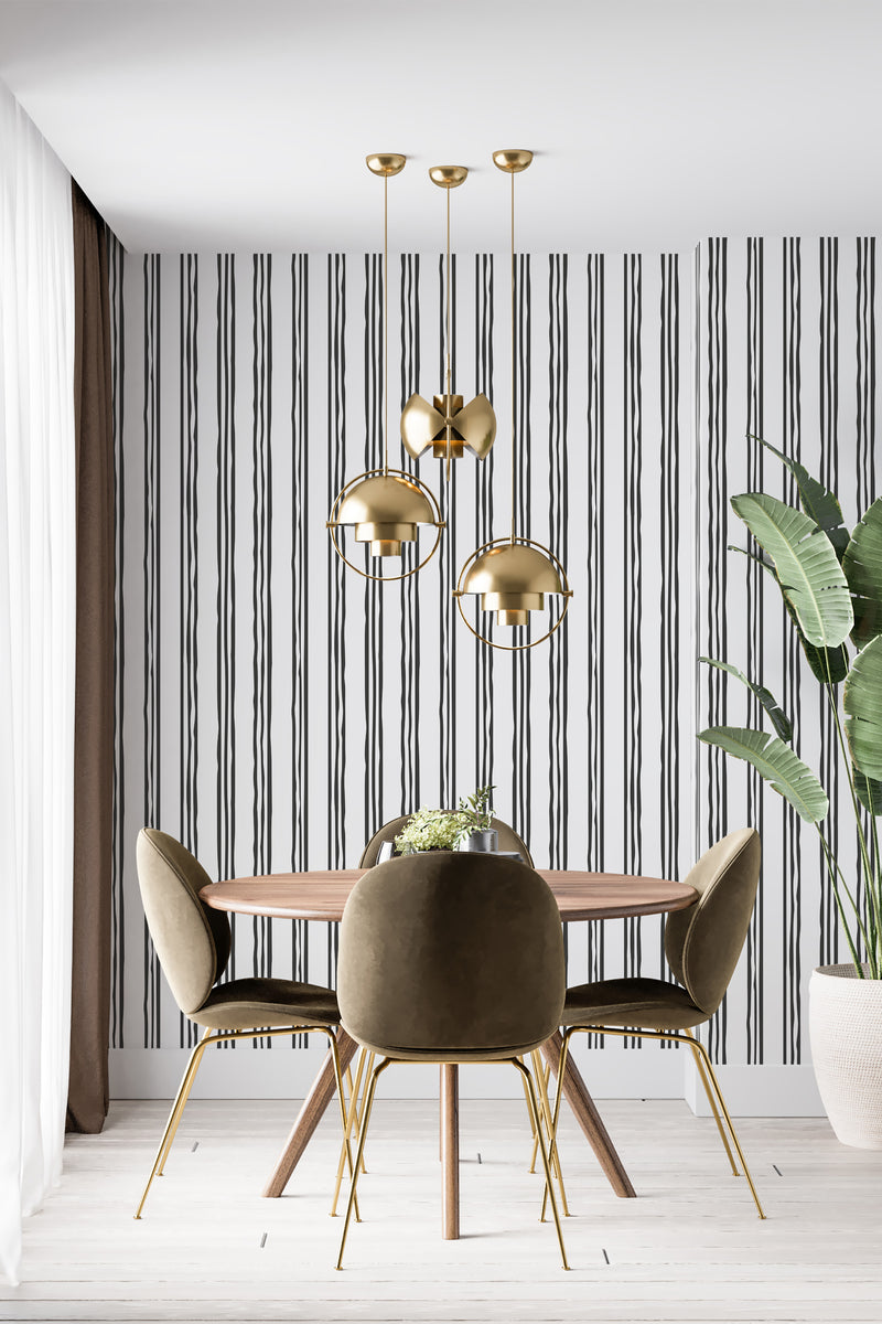 modern dining area velour chair plant bold striped print accent wall