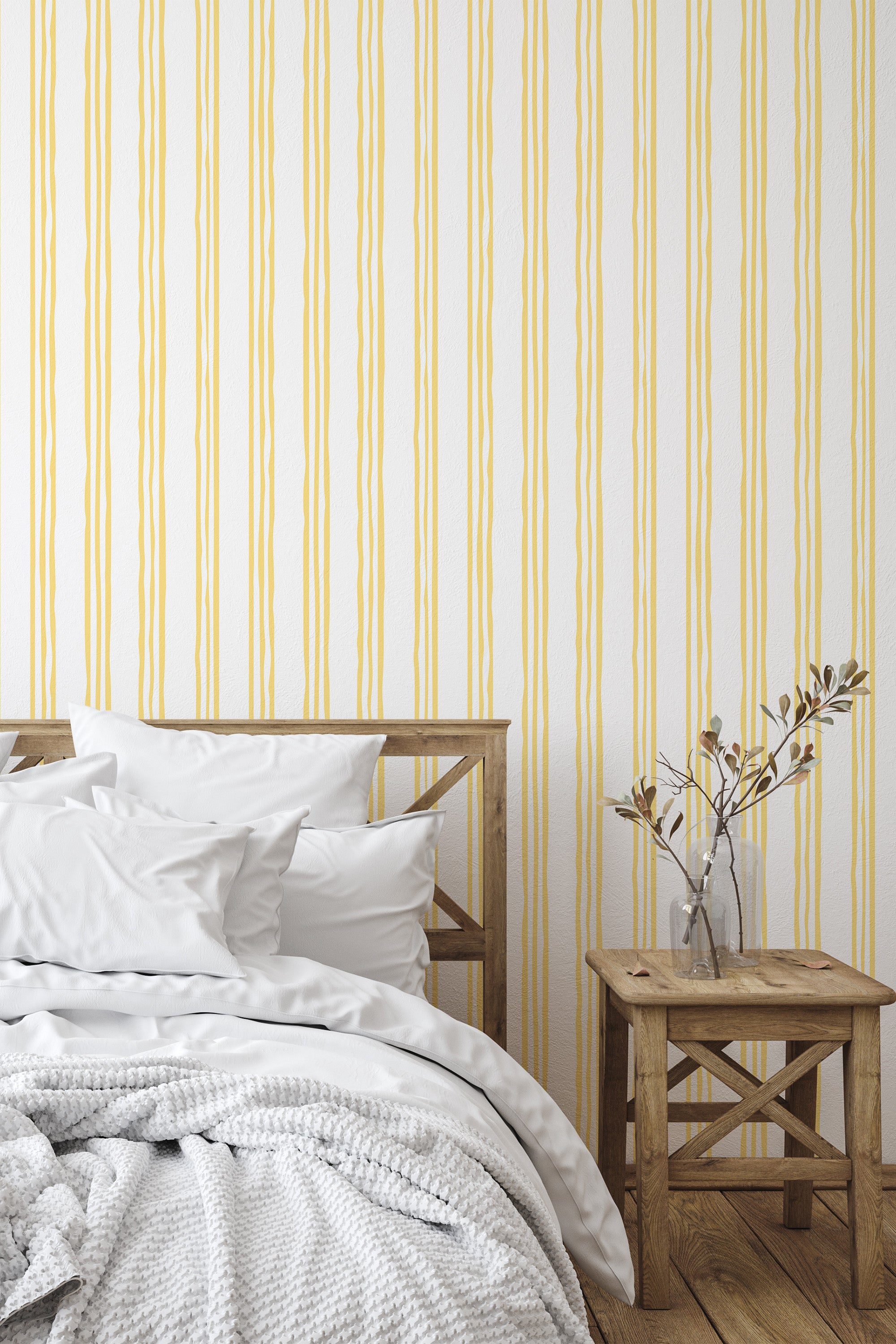 Self-adhesive wallpaper with an uneven striped design of varying thickness and shades of yellow on a white background, creating a subtle, modern pattern perfect for adding texture to the room.