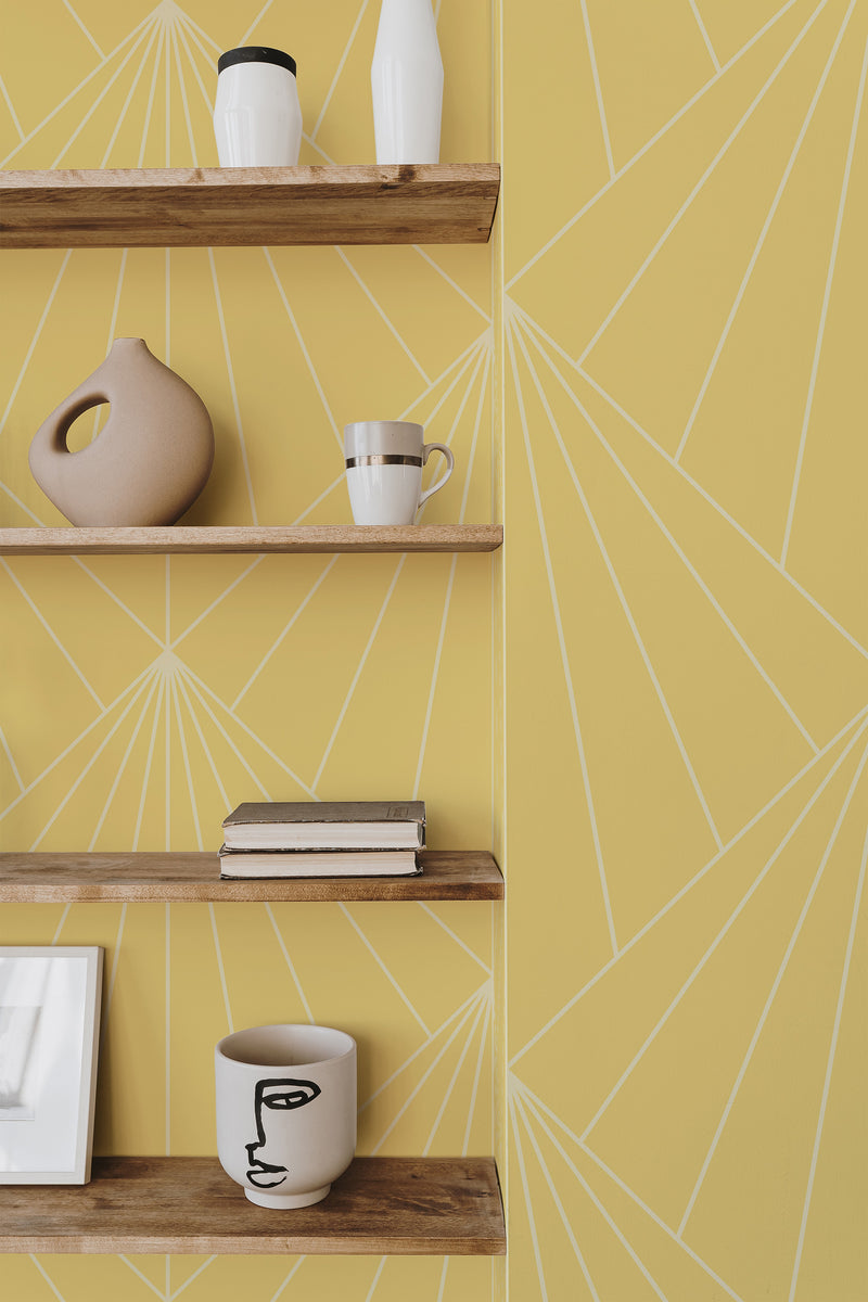 Self-adhesive wallpaper with an Art Deco geometric sun design in a light yellow hue, featuring minimalist white lines radiating outward in a sunburst pattern.