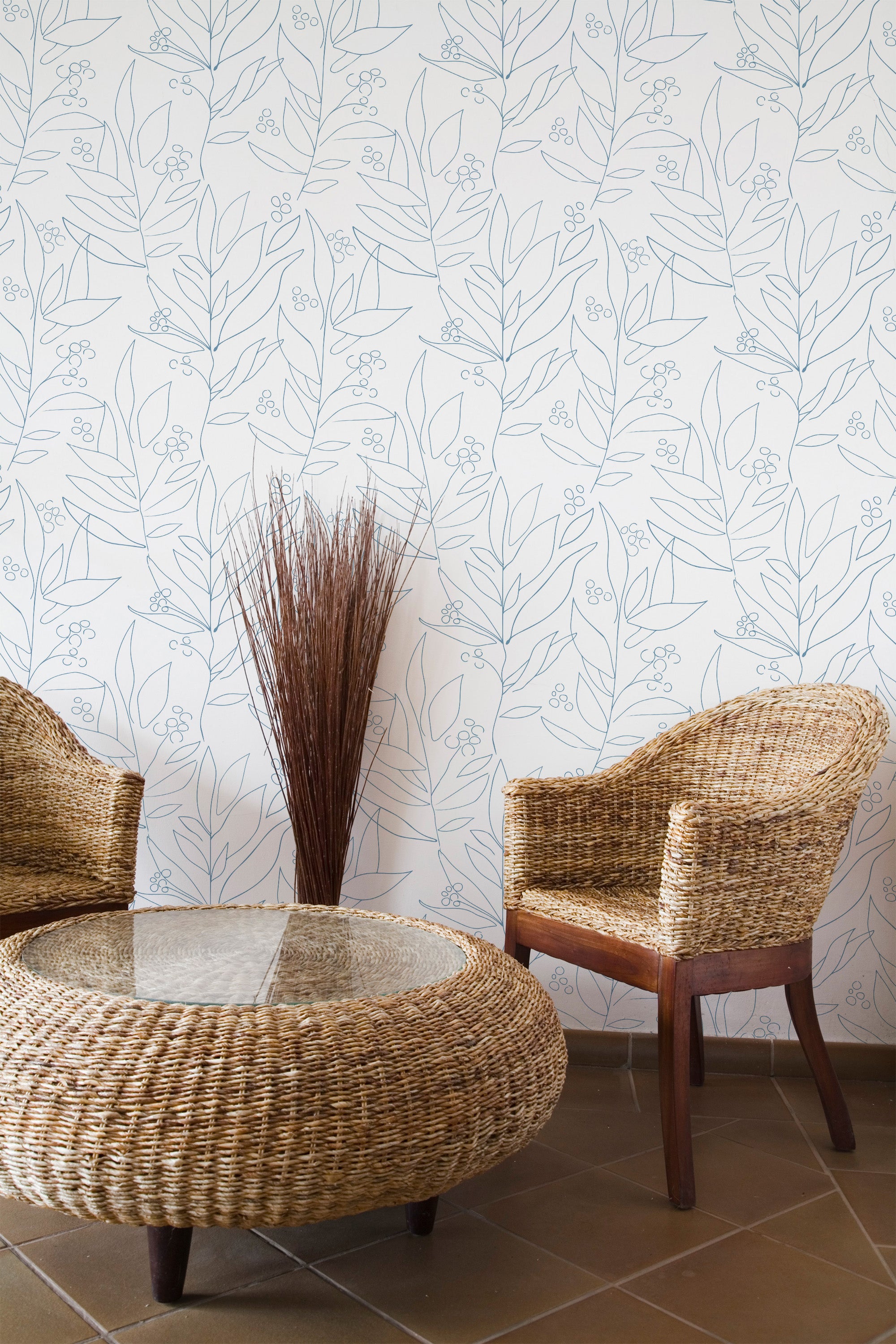 Self-adhesive wallpaper with a minimalist big floral line pattern in light blue, creating a clean and modern look with delicate line drawings of leaves and small flowers on a white background.